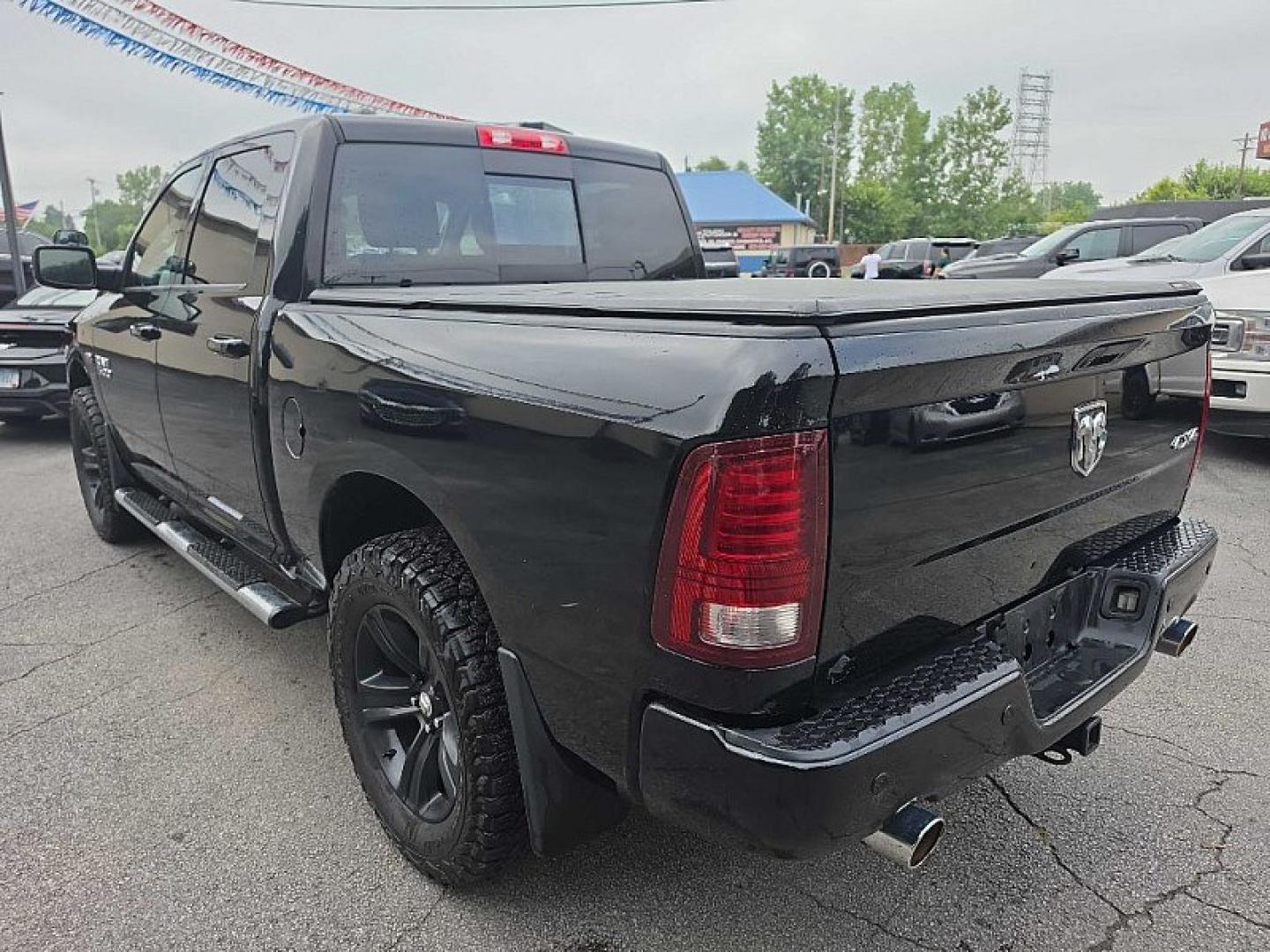 2014 BLACK /BLACK RAM 1500 Sport Crew Cab SWB 4WD (1C6RR7MT2ES) with an 5.7L V8 OHV 16V engine, 6-Speed Automatic transmission, located at 3304 Woodville Road, Northwood, OH, 43619, (419) 210-8019, 41.612694, -83.480743- Photo#2
