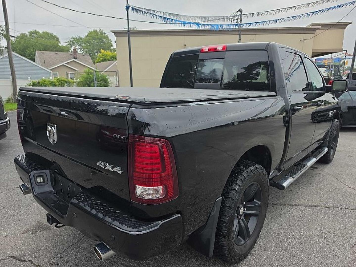 2014 BLACK /BLACK RAM 1500 Sport Crew Cab SWB 4WD (1C6RR7MT2ES) with an 5.7L V8 OHV 16V engine, 6-Speed Automatic transmission, located at 3304 Woodville Road, Northwood, OH, 43619, (419) 210-8019, 41.612694, -83.480743- Photo#4