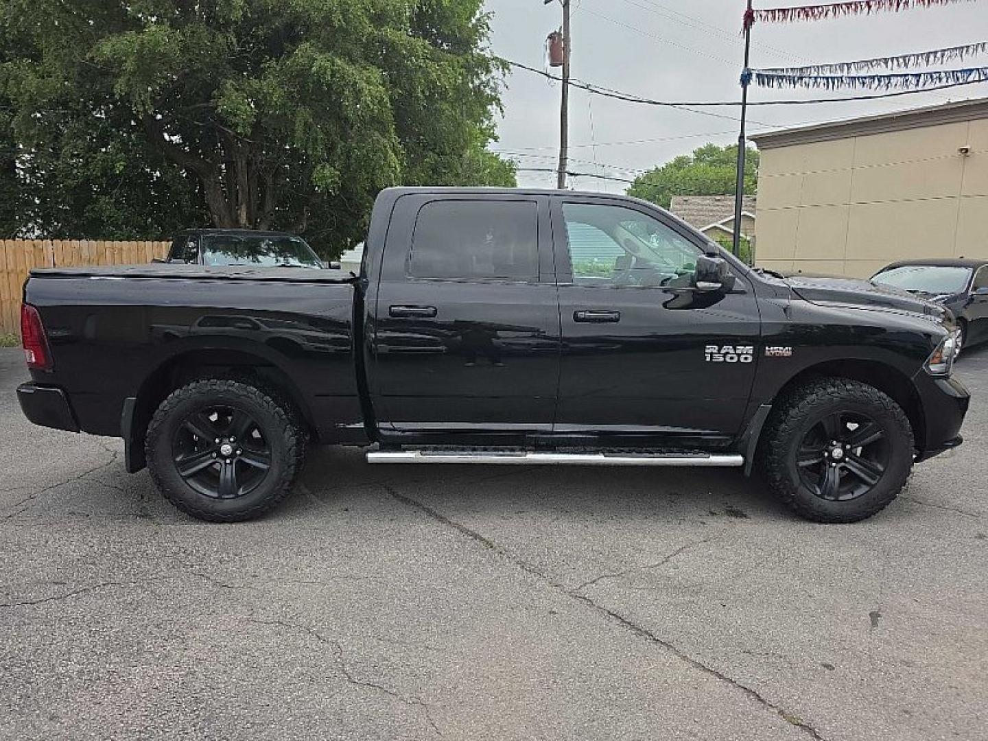 2014 BLACK /BLACK RAM 1500 Sport Crew Cab SWB 4WD (1C6RR7MT2ES) with an 5.7L V8 OHV 16V engine, 6-Speed Automatic transmission, located at 3304 Woodville Road, Northwood, OH, 43619, (419) 210-8019, 41.612694, -83.480743- Photo#5