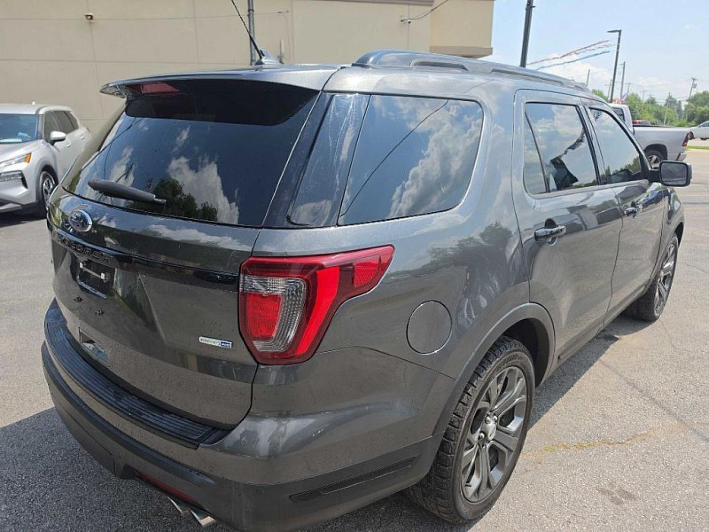 2018 GRAY /BLACK Ford Explorer Sport 4WD (1FM5K8GT5JG) with an 3.5L V6 DOHC 24V engine, 6A transmission, located at 3304 Woodville Road, Northwood, OH, 43619, (419) 210-8019, 41.612694, -83.480743 - Your #1 Destination for Auto Loans and mdash;No Matter Your Credit!At our dealership, we believe everyone deserves the opportunity to drive their dream car and mdash;whether you have good credit, bad credit, or no credit at all. With a wide selection of hundreds of cars, trucks, and SUVs, you'll fin- Photo#4