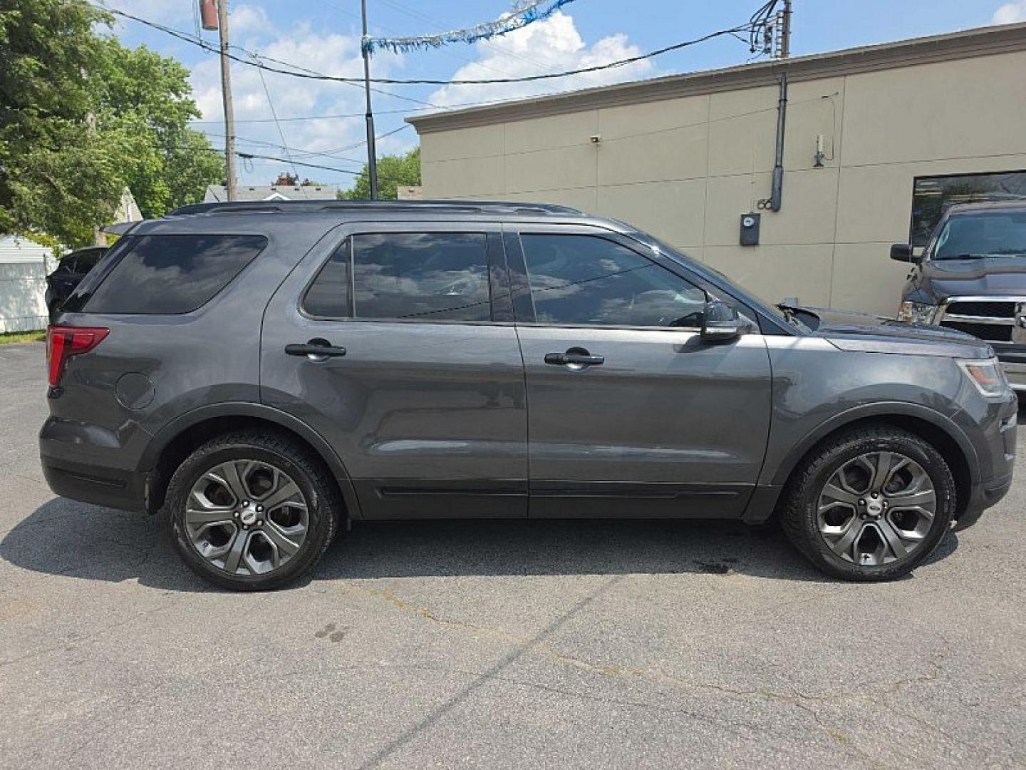2018 GRAY /BLACK Ford Explorer Sport 4WD (1FM5K8GT5JG) with an 3.5L V6 DOHC 24V engine, 6A transmission, located at 3304 Woodville Road, Northwood, OH, 43619, (419) 210-8019, 41.612694, -83.480743 - Your #1 Destination for Auto Loans and mdash;No Matter Your Credit!At our dealership, we believe everyone deserves the opportunity to drive their dream car and mdash;whether you have good credit, bad credit, or no credit at all. With a wide selection of hundreds of cars, trucks, and SUVs, you'll fin- Photo#5