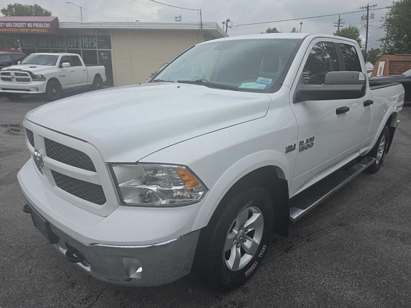 2015 WHITE /GRAY RAM 1500 SLT Quad Cab 4WD (1C6RR7GT7FS) with an 5.7L V8 OHV 16V engine, 6-Speed Automatic transmission, located at 3304 Woodville Road, Northwood, OH, 43619, (419) 210-8019, 41.612694, -83.480743 - Your #1 Destination for Auto Loans and mdash;No Matter Your Credit!At our dealership, we believe everyone deserves the opportunity to drive their dream car and mdash;whether you have good credit, bad credit, or no credit at all. With a wide selection of hundreds of cars, trucks, and SUVs, you'll fin- Photo#0