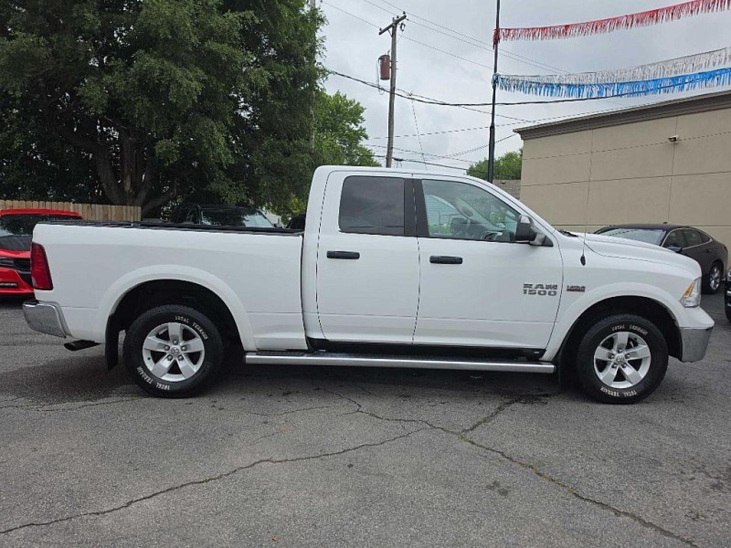 2015 WHITE /GRAY RAM 1500 SLT Quad Cab 4WD (1C6RR7GT7FS) with an 5.7L V8 OHV 16V engine, 6-Speed Automatic transmission, located at 3304 Woodville Road, Northwood, OH, 43619, (419) 210-8019, 41.612694, -83.480743 - Your #1 Destination for Auto Loans and mdash;No Matter Your Credit!At our dealership, we believe everyone deserves the opportunity to drive their dream car and mdash;whether you have good credit, bad credit, or no credit at all. With a wide selection of hundreds of cars, trucks, and SUVs, you'll fin- Photo#5