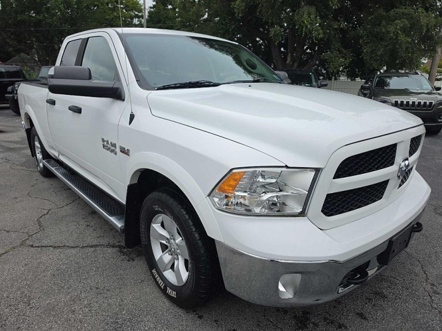2015 WHITE /GRAY RAM 1500 SLT Quad Cab 4WD (1C6RR7GT7FS) with an 5.7L V8 OHV 16V engine, 6-Speed Automatic transmission, located at 3304 Woodville Road, Northwood, OH, 43619, (419) 210-8019, 41.612694, -83.480743 - Your #1 Destination for Auto Loans and mdash;No Matter Your Credit!At our dealership, we believe everyone deserves the opportunity to drive their dream car and mdash;whether you have good credit, bad credit, or no credit at all. With a wide selection of hundreds of cars, trucks, and SUVs, you'll fin- Photo#6