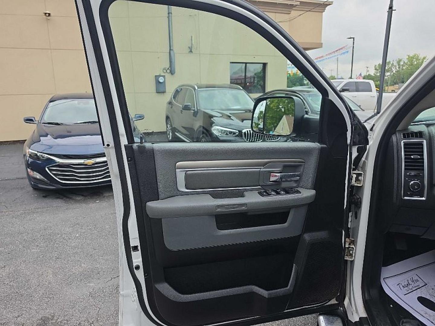 2015 WHITE /GRAY RAM 1500 SLT Quad Cab 4WD (1C6RR7GT7FS) with an 5.7L V8 OHV 16V engine, 6-Speed Automatic transmission, located at 3304 Woodville Road, Northwood, OH, 43619, (419) 210-8019, 41.612694, -83.480743 - Your #1 Destination for Auto Loans and mdash;No Matter Your Credit!At our dealership, we believe everyone deserves the opportunity to drive their dream car and mdash;whether you have good credit, bad credit, or no credit at all. With a wide selection of hundreds of cars, trucks, and SUVs, you'll fin- Photo#8