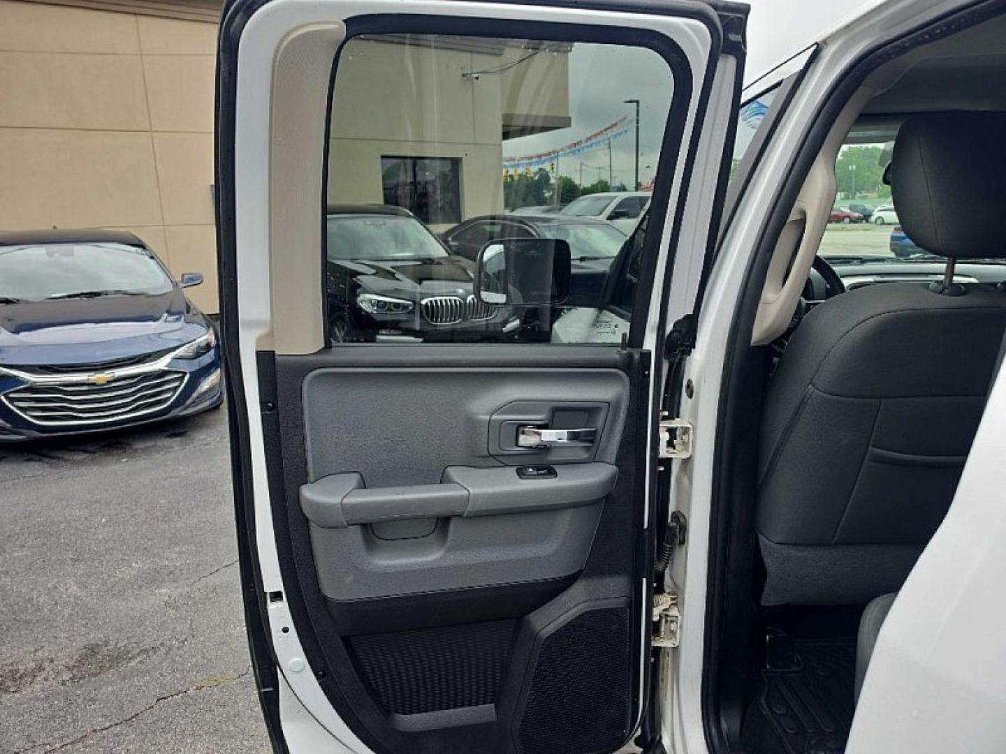 2015 WHITE /GRAY RAM 1500 SLT Quad Cab 4WD (1C6RR7GT7FS) with an 5.7L V8 OHV 16V engine, 6-Speed Automatic transmission, located at 3304 Woodville Road, Northwood, OH, 43619, (419) 210-8019, 41.612694, -83.480743 - Your #1 Destination for Auto Loans and mdash;No Matter Your Credit!At our dealership, we believe everyone deserves the opportunity to drive their dream car and mdash;whether you have good credit, bad credit, or no credit at all. With a wide selection of hundreds of cars, trucks, and SUVs, you'll fin- Photo#10