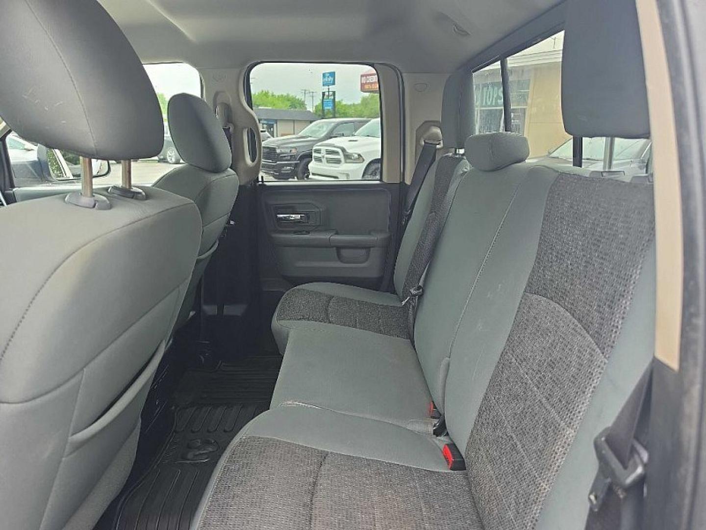 2015 WHITE /GRAY RAM 1500 SLT Quad Cab 4WD (1C6RR7GT7FS) with an 5.7L V8 OHV 16V engine, 6-Speed Automatic transmission, located at 3304 Woodville Road, Northwood, OH, 43619, (419) 210-8019, 41.612694, -83.480743 - Your #1 Destination for Auto Loans and mdash;No Matter Your Credit!At our dealership, we believe everyone deserves the opportunity to drive their dream car and mdash;whether you have good credit, bad credit, or no credit at all. With a wide selection of hundreds of cars, trucks, and SUVs, you'll fin- Photo#11