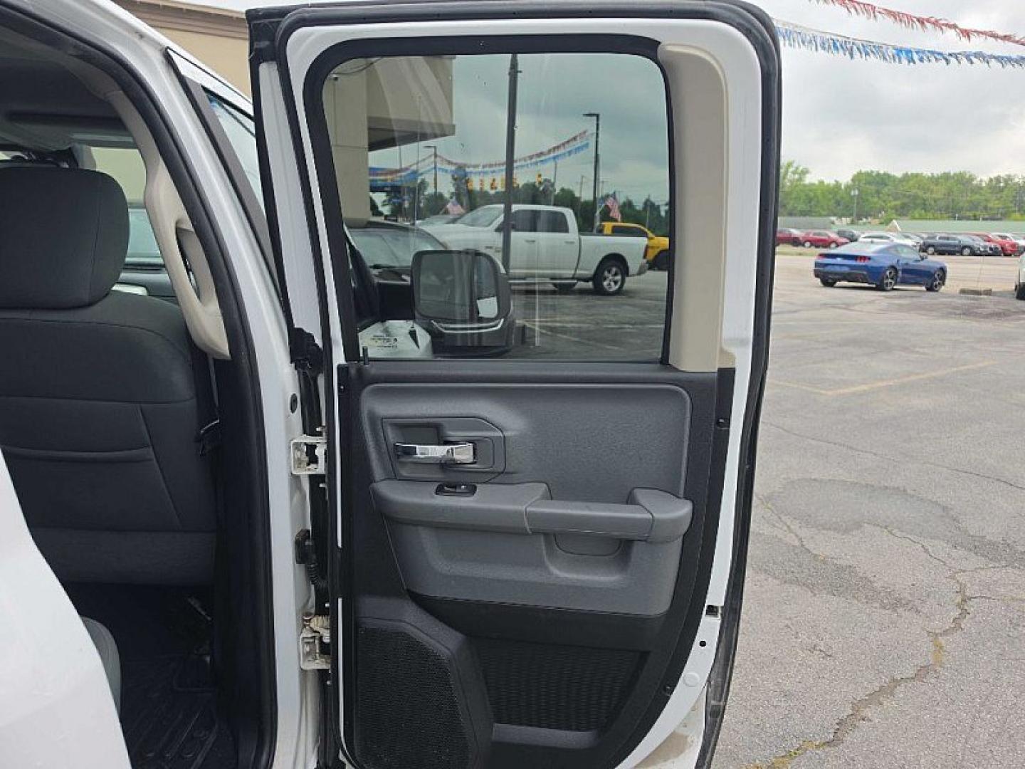 2015 WHITE /GRAY RAM 1500 SLT Quad Cab 4WD (1C6RR7GT7FS) with an 5.7L V8 OHV 16V engine, 6-Speed Automatic transmission, located at 3304 Woodville Road, Northwood, OH, 43619, (419) 210-8019, 41.612694, -83.480743 - Your #1 Destination for Auto Loans and mdash;No Matter Your Credit!At our dealership, we believe everyone deserves the opportunity to drive their dream car and mdash;whether you have good credit, bad credit, or no credit at all. With a wide selection of hundreds of cars, trucks, and SUVs, you'll fin- Photo#14