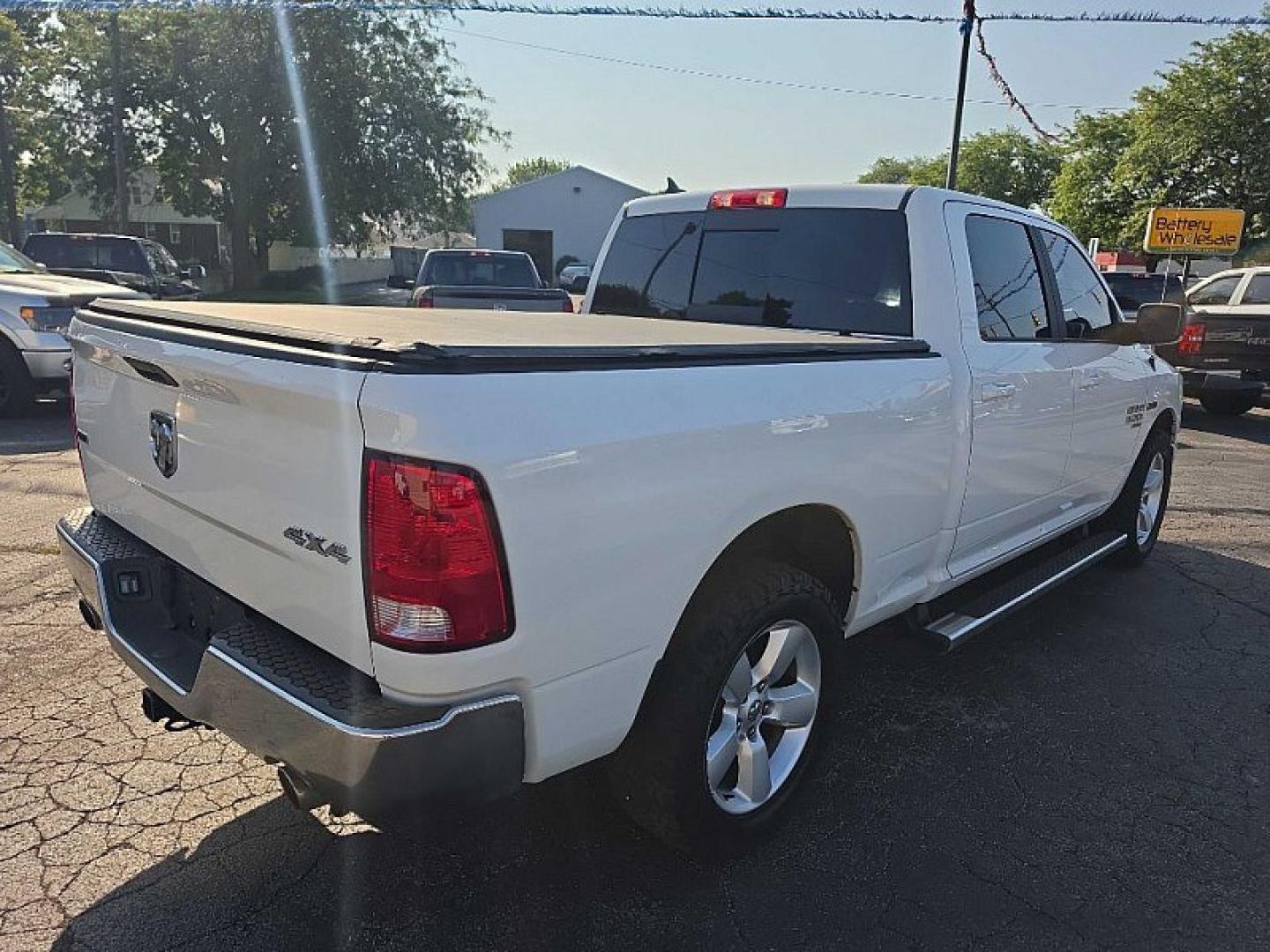 2019 WHITE /GRAY RAM 1500 SLT Crew Cab LWB 4WD (1C6RR7TM0KS) with an 3.0L V6 DOHC 24V DIESEL engine, 8A transmission, located at 3304 Woodville Road, Northwood, OH, 43619, (419) 210-8019, 41.612694, -83.480743 - Your #1 Destination for Auto Loans and mdash;No Matter Your Credit!At our dealership, we believe everyone deserves the opportunity to drive their dream car and mdash;whether you have good credit, bad credit, or no credit at all. With a wide selection of hundreds of cars, trucks, and SUVs, you'll fin- Photo#4
