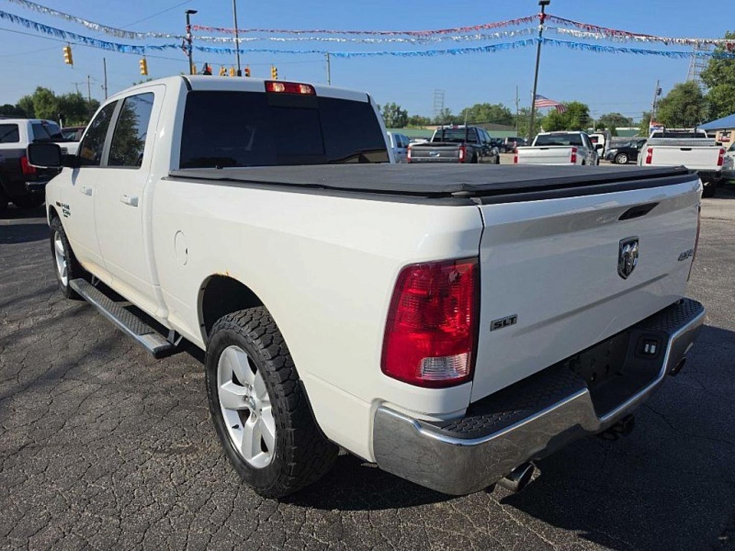 2019 WHITE /GRAY RAM 1500 SLT Crew Cab LWB 4WD (1C6RR7TM0KS) with an 3.0L V6 DOHC 24V DIESEL engine, 8A transmission, located at 3304 Woodville Road, Northwood, OH, 43619, (419) 210-8019, 41.612694, -83.480743 - Your #1 Destination for Auto Loans and mdash;No Matter Your Credit!At our dealership, we believe everyone deserves the opportunity to drive their dream car and mdash;whether you have good credit, bad credit, or no credit at all. With a wide selection of hundreds of cars, trucks, and SUVs, you'll fin- Photo#2