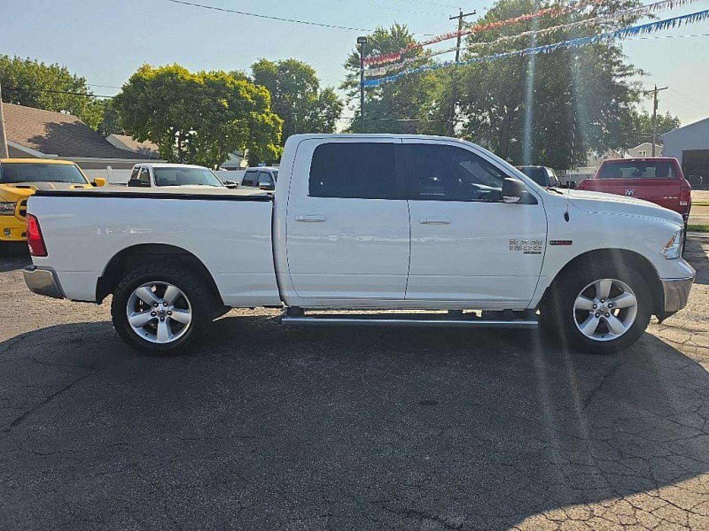 2019 WHITE /GRAY RAM 1500 SLT Crew Cab LWB 4WD (1C6RR7TM0KS) with an 3.0L V6 DOHC 24V DIESEL engine, 8A transmission, located at 3304 Woodville Road, Northwood, OH, 43619, (419) 210-8019, 41.612694, -83.480743 - Your #1 Destination for Auto Loans and mdash;No Matter Your Credit!At our dealership, we believe everyone deserves the opportunity to drive their dream car and mdash;whether you have good credit, bad credit, or no credit at all. With a wide selection of hundreds of cars, trucks, and SUVs, you'll fin- Photo#5