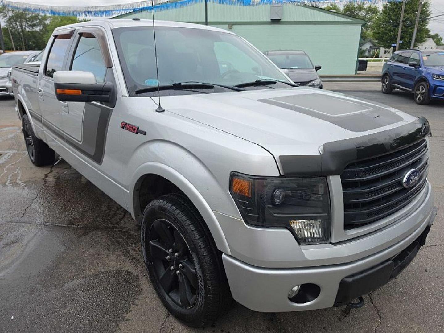 2014 SILVER /BLACK Ford F-150 FX4 SuperCrew 5.5-ft. Bed 4WD (1FTFW1ET3EF) with an 3.5L V6 TURBO engine, 6A transmission, located at 3304 Woodville Road, Northwood, OH, 43619, (419) 210-8019, 41.612694, -83.480743 - Your #1 Destination for Auto Loans and mdash;No Matter Your Credit!At our dealership, we believe everyone deserves the opportunity to drive their dream car and mdash;whether you have good credit, bad credit, or no credit at all. With a wide selection of hundreds of cars, trucks, and SUVs, you'll fin- Photo#6