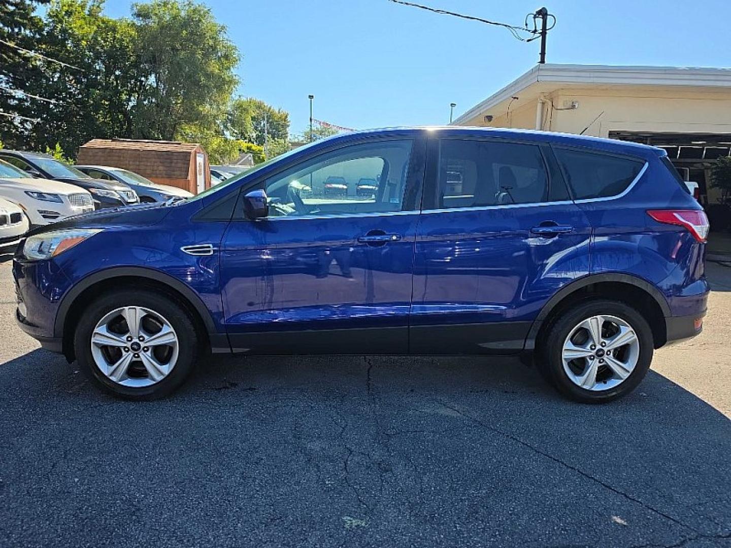 2016 BLUE /BLACK Ford Escape SE 4WD (1FMCU9GX2GU) with an 1.6L L4 DOHC 16V engine, 6A transmission, located at 3304 Woodville Road, Northwood, OH, 43619, (419) 210-8019, 41.612694, -83.480743 - Your #1 Destination for Auto Loans and mdash;No Matter Your Credit!At our dealership, we believe everyone deserves the opportunity to drive their dream car and mdash;whether you have good credit, bad credit, or no credit at all. With a wide selection of hundreds of cars, trucks, and SUVs, you'll fin- Photo#1