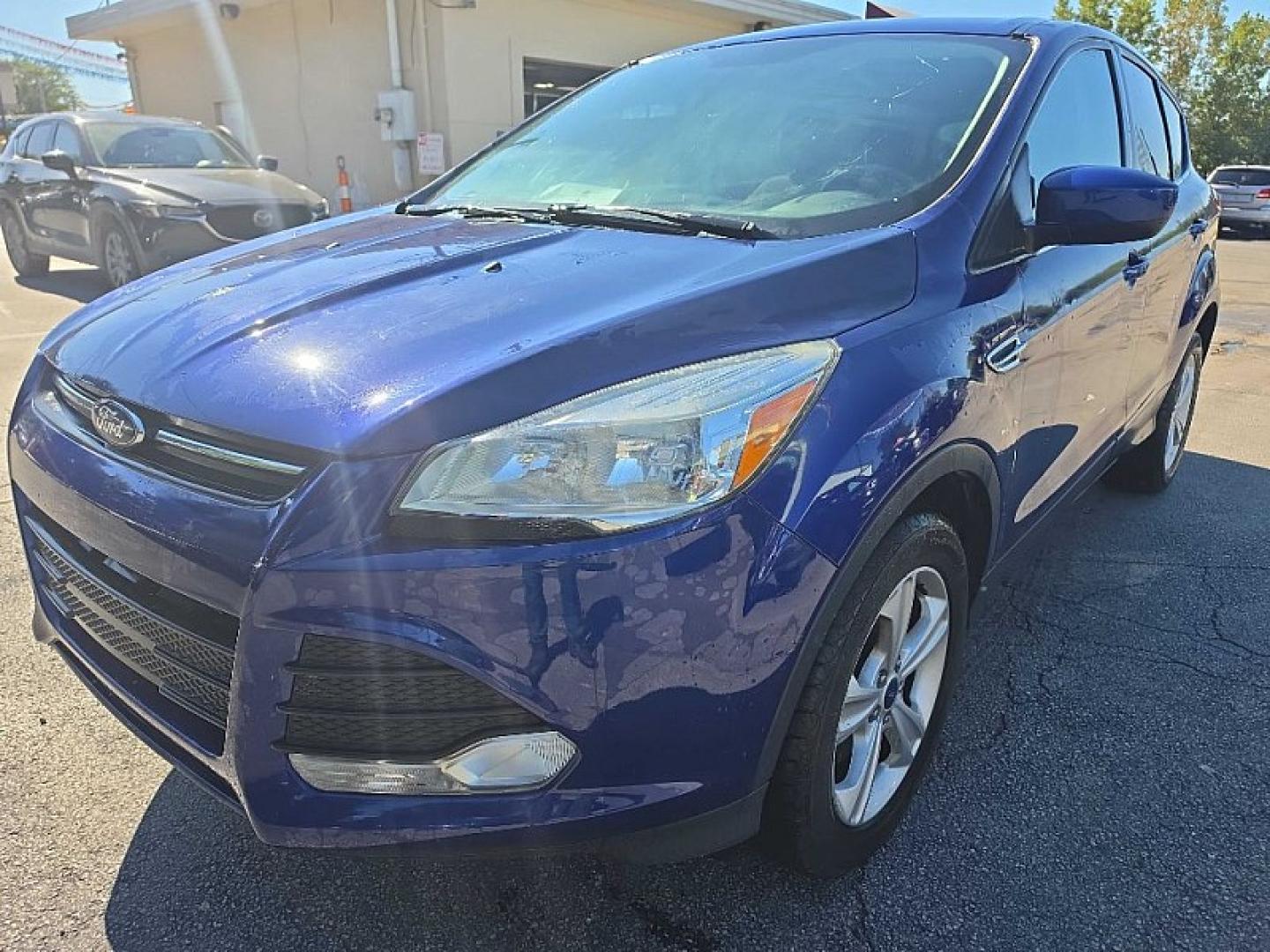 2016 BLUE /BLACK Ford Escape SE 4WD (1FMCU9GX2GU) with an 1.6L L4 DOHC 16V engine, 6A transmission, located at 3304 Woodville Road, Northwood, OH, 43619, (419) 210-8019, 41.612694, -83.480743 - Your #1 Destination for Auto Loans and mdash;No Matter Your Credit!At our dealership, we believe everyone deserves the opportunity to drive their dream car and mdash;whether you have good credit, bad credit, or no credit at all. With a wide selection of hundreds of cars, trucks, and SUVs, you'll fin- Photo#0