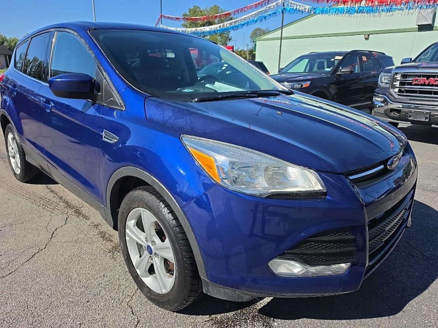 2016 BLUE /BLACK Ford Escape SE 4WD (1FMCU9GX2GU) with an 1.6L L4 DOHC 16V engine, 6A transmission, located at 3304 Woodville Road, Northwood, OH, 43619, (419) 210-8019, 41.612694, -83.480743 - Your #1 Destination for Auto Loans and mdash;No Matter Your Credit!At our dealership, we believe everyone deserves the opportunity to drive their dream car and mdash;whether you have good credit, bad credit, or no credit at all. With a wide selection of hundreds of cars, trucks, and SUVs, you'll fin- Photo#6