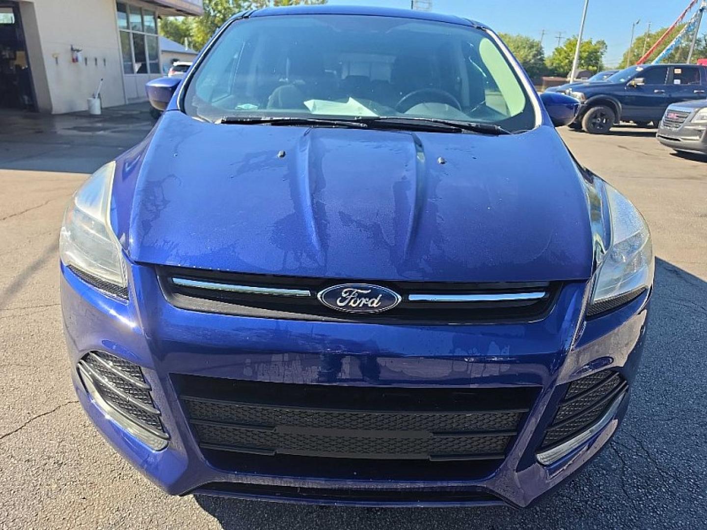2016 BLUE /BLACK Ford Escape SE 4WD (1FMCU9GX2GU) with an 1.6L L4 DOHC 16V engine, 6A transmission, located at 3304 Woodville Road, Northwood, OH, 43619, (419) 210-8019, 41.612694, -83.480743 - Your #1 Destination for Auto Loans and mdash;No Matter Your Credit!At our dealership, we believe everyone deserves the opportunity to drive their dream car and mdash;whether you have good credit, bad credit, or no credit at all. With a wide selection of hundreds of cars, trucks, and SUVs, you'll fin- Photo#7