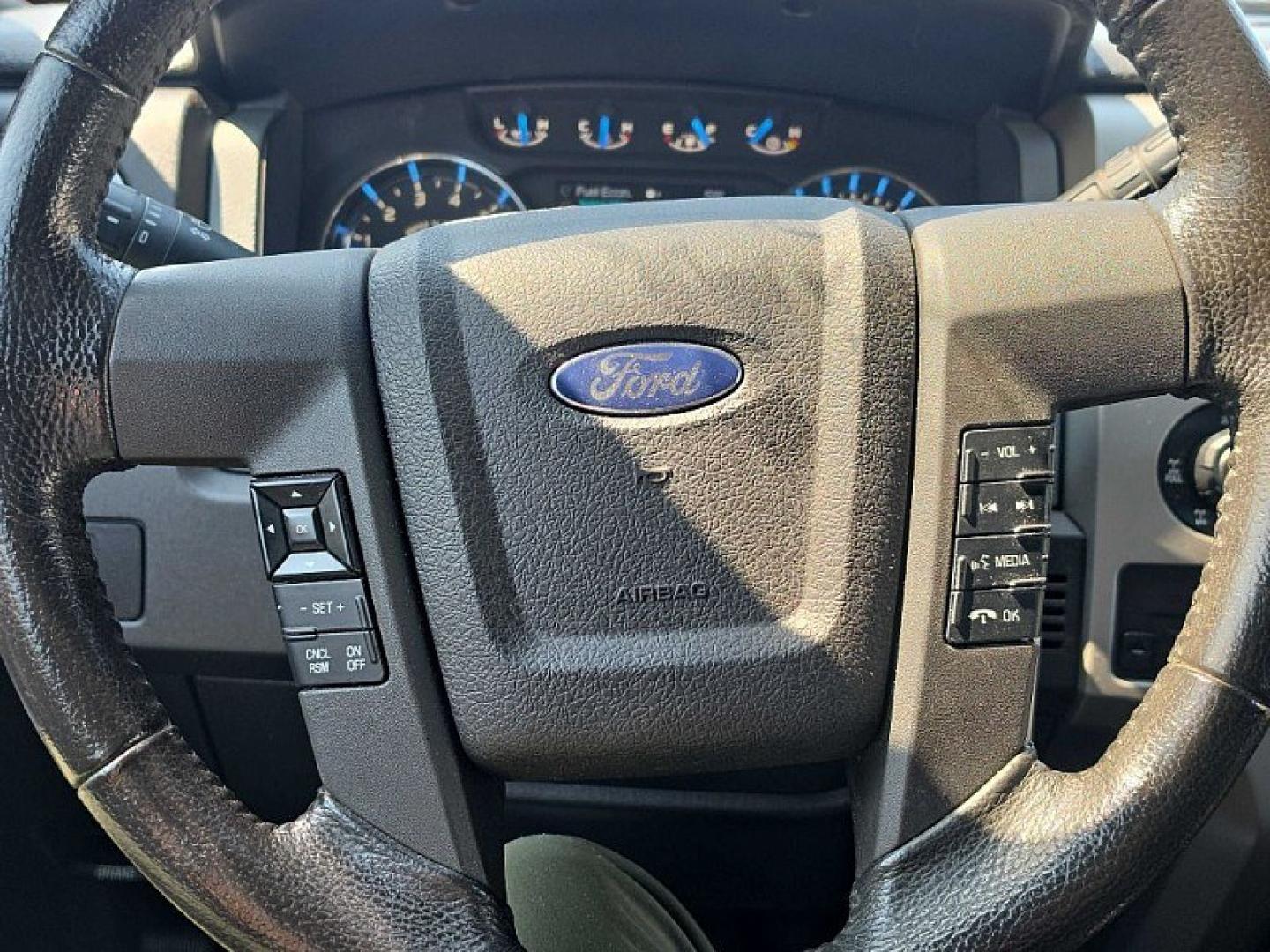 2013 BLUE /GRAY Ford F-150 XLT SuperCrew 6.5-ft. Bed 4WD (1FTFW1EF2DF) with an 5.0L V8 engine, 6-Speed Automatic transmission, located at 3304 Woodville Road, Northwood, OH, 43619, (419) 210-8019, 41.612694, -83.480743 - Your #1 Destination for Auto Loans and mdash;No Matter Your Credit!At our dealership, we believe everyone deserves the opportunity to drive their dream car and mdash;whether you have good credit, bad credit, or no credit at all. With a wide selection of hundreds of cars, trucks, and SUVs, you'll fin- Photo#19