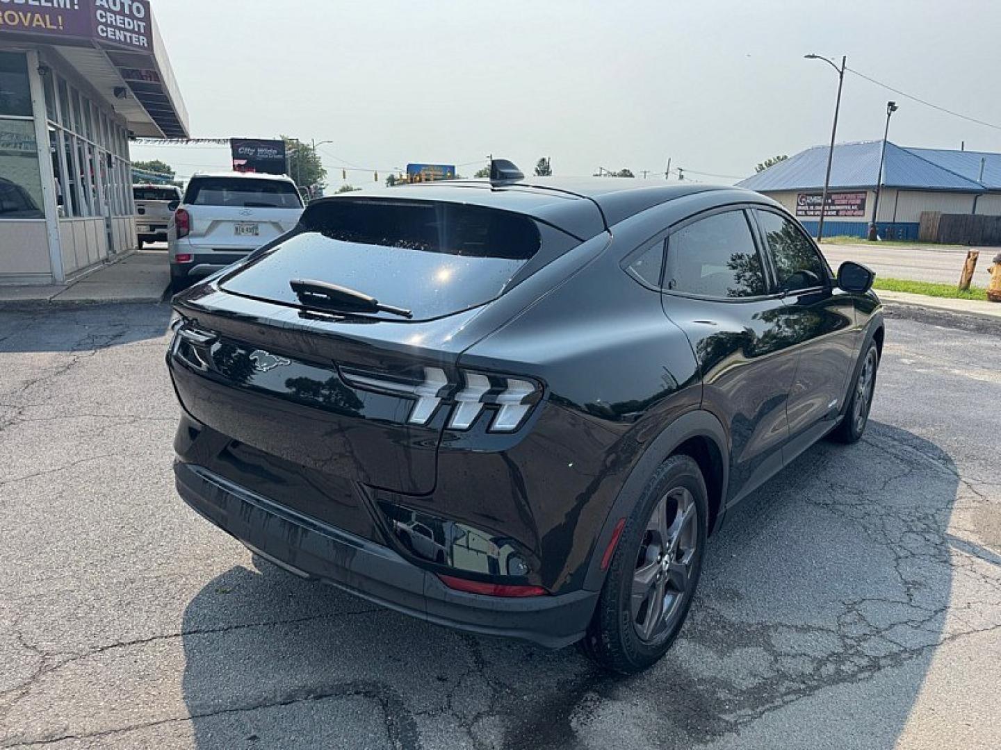 2023 BLACK /BLACK Ford Mustang Mach-E Select (3FMTK1RM1PM) with an ELECTRIC engine, 1A transmission, located at 3304 Woodville Road, Northwood, OH, 43619, (419) 210-8019, 41.612694, -83.480743 - Your #1 Destination for Auto Loans and mdash;No Matter Your Credit!At our dealership, we believe everyone deserves the opportunity to drive their dream car and mdash;whether you have good credit, bad credit, or no credit at all. With a wide selection of hundreds of cars, trucks, and SUVs, you'll fin- Photo#4