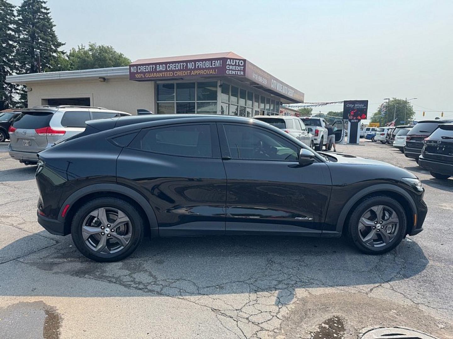 2023 BLACK /BLACK Ford Mustang Mach-E Select (3FMTK1RM1PM) with an ELECTRIC engine, 1A transmission, located at 3304 Woodville Road, Northwood, OH, 43619, (419) 210-8019, 41.612694, -83.480743 - Your #1 Destination for Auto Loans and mdash;No Matter Your Credit!At our dealership, we believe everyone deserves the opportunity to drive their dream car and mdash;whether you have good credit, bad credit, or no credit at all. With a wide selection of hundreds of cars, trucks, and SUVs, you'll fin- Photo#5