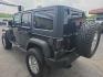 2014 BLACK /BLACK Jeep Wrangler Unlimited Sport 4WD (1C4BJWDG3EL) with an 3.6L V6 DOHC 24V FFV engine, Automatic 5-Spd transmission, located at 3304 Woodville Road, Northwood, OH, 43619, (419) 210-8019, 41.612694, -83.480743 - Your #1 Destination for Auto Loans and mdash;No Matter Your Credit!At our dealership, we believe everyone deserves the opportunity to drive their dream car and mdash;whether you have good credit, bad credit, or no credit at all. With a wide selection of hundreds of cars, trucks, and SUVs, you'll fin- Photo#2