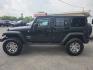 2014 BLACK /BLACK Jeep Wrangler Unlimited Sport 4WD (1C4BJWDG3EL) with an 3.6L V6 DOHC 24V FFV engine, Automatic 5-Spd transmission, located at 3304 Woodville Road, Northwood, OH, 43619, (419) 210-8019, 41.612694, -83.480743 - Your #1 Destination for Auto Loans and mdash;No Matter Your Credit!At our dealership, we believe everyone deserves the opportunity to drive their dream car and mdash;whether you have good credit, bad credit, or no credit at all. With a wide selection of hundreds of cars, trucks, and SUVs, you'll fin- Photo#1