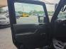2014 BLACK /BLACK Jeep Wrangler Unlimited Sport 4WD (1C4BJWDG3EL) with an 3.6L V6 DOHC 24V FFV engine, Automatic 5-Spd transmission, located at 3304 Woodville Road, Northwood, OH, 43619, (419) 210-8019, 41.612694, -83.480743 - Your #1 Destination for Auto Loans and mdash;No Matter Your Credit!At our dealership, we believe everyone deserves the opportunity to drive their dream car and mdash;whether you have good credit, bad credit, or no credit at all. With a wide selection of hundreds of cars, trucks, and SUVs, you'll fin- Photo#8