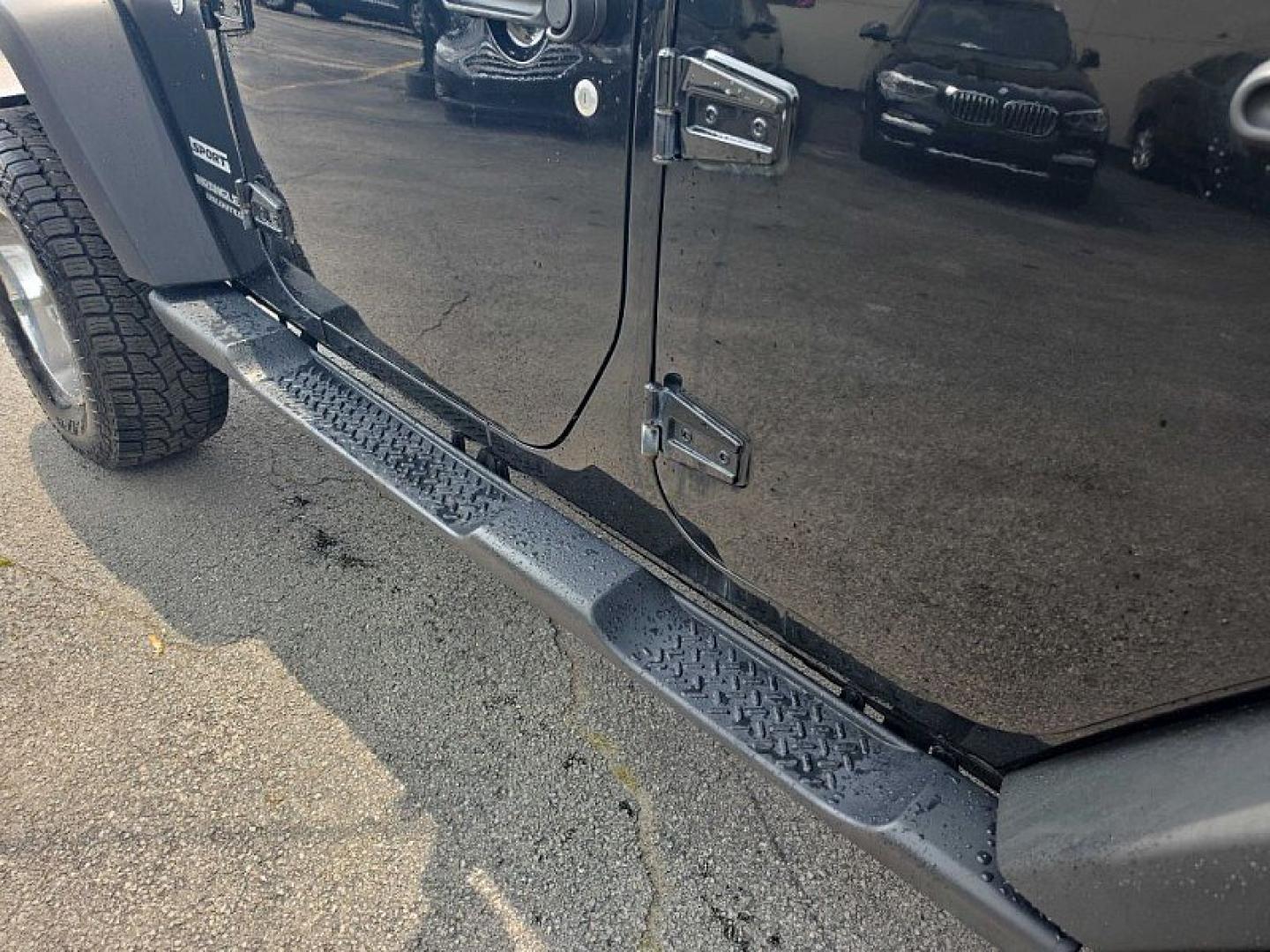 2014 BLACK /BLACK Jeep Wrangler Unlimited Sport 4WD (1C4BJWDG3EL) with an 3.6L V6 DOHC 24V FFV engine, Automatic 5-Spd transmission, located at 3304 Woodville Road, Northwood, OH, 43619, (419) 210-8019, 41.612694, -83.480743 - Your #1 Destination for Auto Loans and mdash;No Matter Your Credit!At our dealership, we believe everyone deserves the opportunity to drive their dream car and mdash;whether you have good credit, bad credit, or no credit at all. With a wide selection of hundreds of cars, trucks, and SUVs, you'll fin- Photo#12