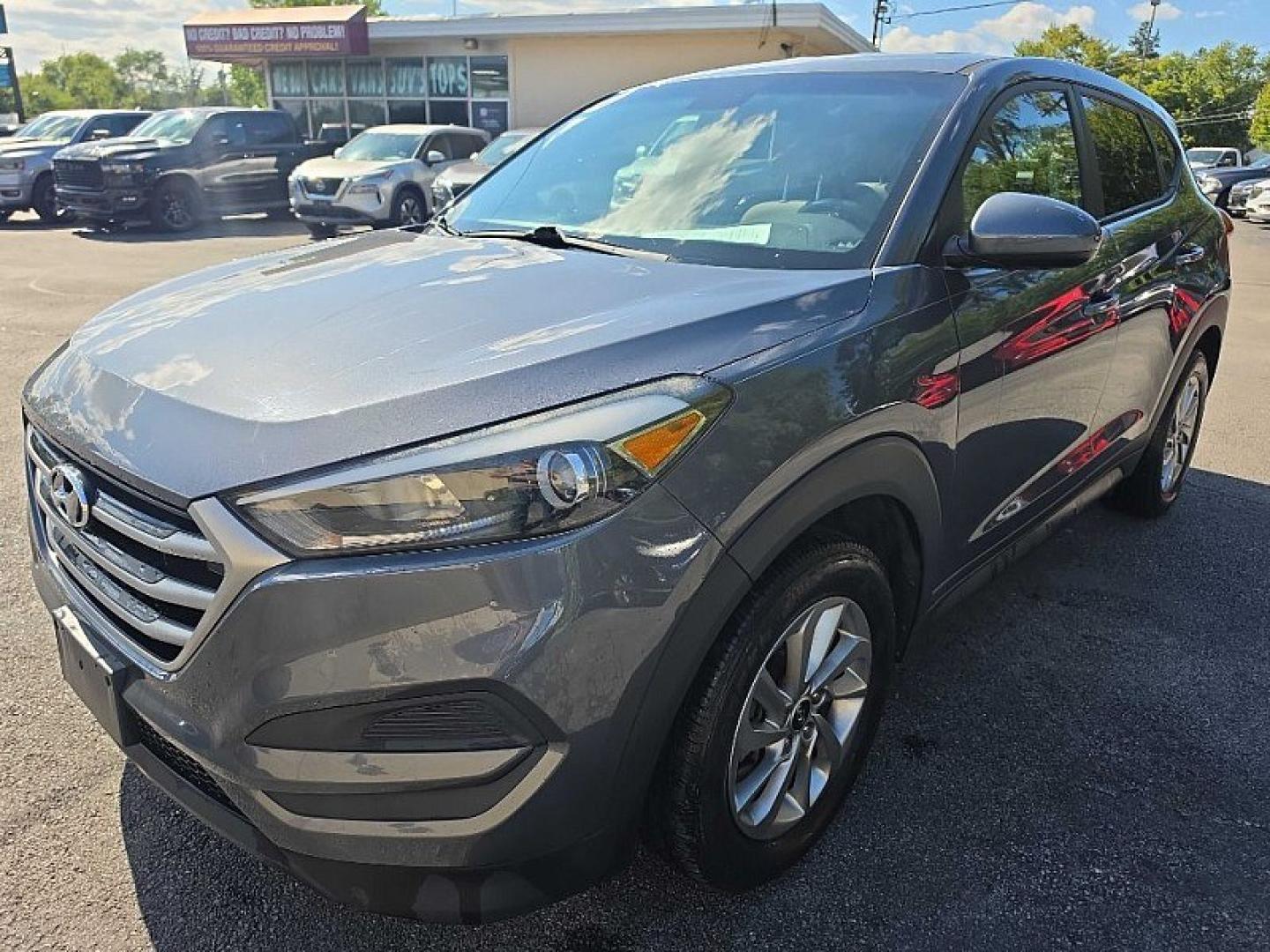 2018 GRAY /GRAY Hyundai Tucson SE AWD (KM8J2CA43JU) with an 2.0L L4 DOHC 16V engine, 6A transmission, located at 3304 Woodville Road, Northwood, OH, 43619, (419) 210-8019, 41.612694, -83.480743 - Your #1 Destination for Auto Loans and mdash;No Matter Your Credit!At our dealership, we believe everyone deserves the opportunity to drive their dream car and mdash;whether you have good credit, bad credit, or no credit at all. With a wide selection of hundreds of cars, trucks, and SUVs, you'll fin- Photo#0