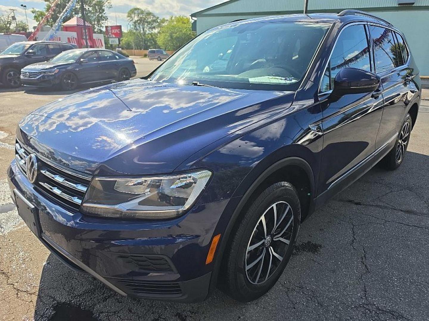 2021 BLUE /PUSHB Volkswagen Tiguan SE 4Motion AWD (3VV2B7AX0MM) with an 2.0L L4 DOHC 16V TURBO engine, 8A transmission, located at 3304 Woodville Road, Northwood, OH, 43619, (419) 210-8019, 41.612694, -83.480743 - Your #1 Destination for Auto Loans and mdash;No Matter Your Credit!At our dealership, we believe everyone deserves the opportunity to drive their dream car and mdash;whether you have good credit, bad credit, or no credit at all. With a wide selection of hundreds of cars, trucks, and SUVs, you'll fin- Photo#0