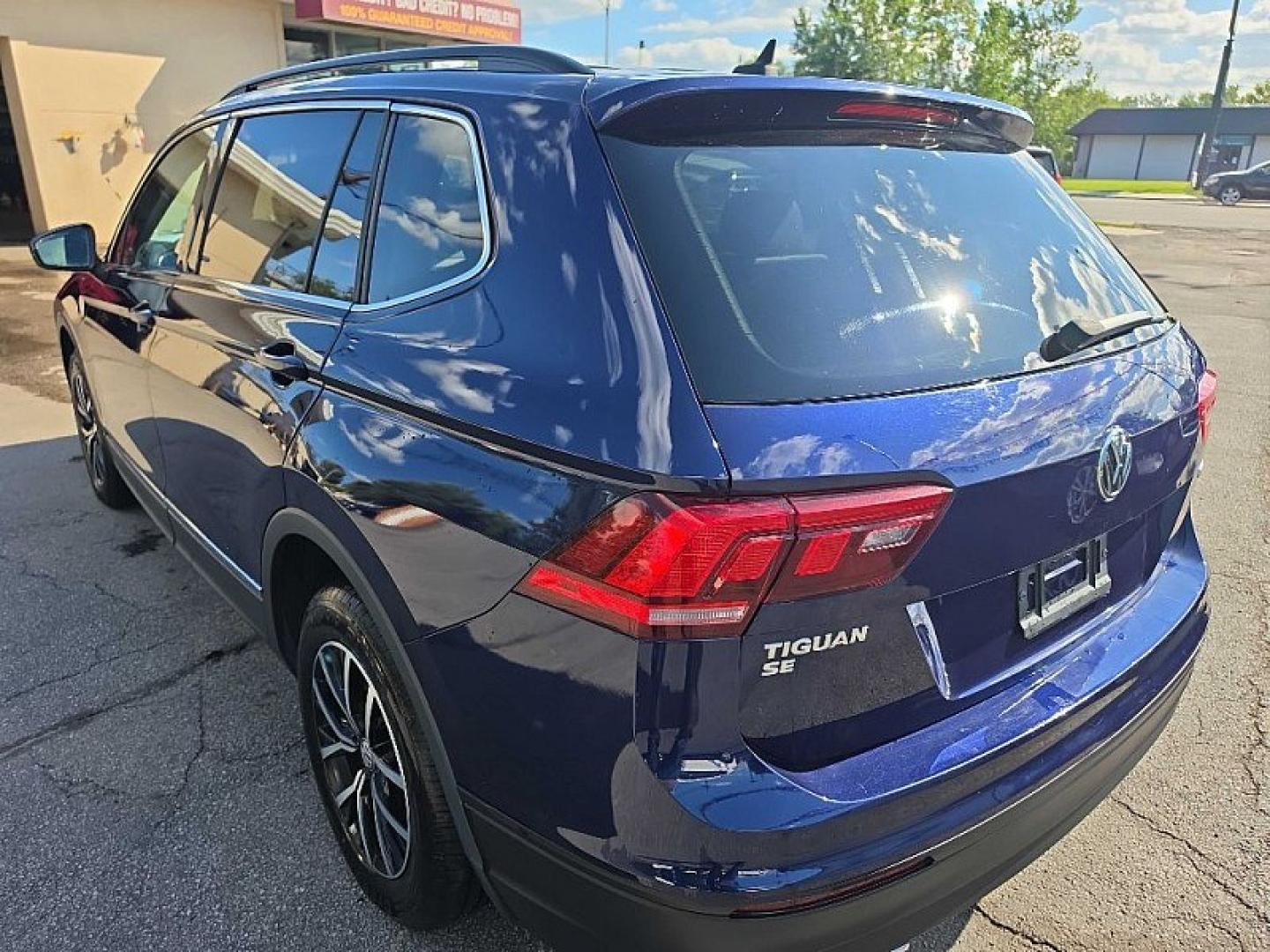 2021 BLUE /PUSHB Volkswagen Tiguan SE 4Motion AWD (3VV2B7AX0MM) with an 2.0L L4 DOHC 16V TURBO engine, 8A transmission, located at 3304 Woodville Road, Northwood, OH, 43619, (419) 210-8019, 41.612694, -83.480743 - Your #1 Destination for Auto Loans and mdash;No Matter Your Credit!At our dealership, we believe everyone deserves the opportunity to drive their dream car and mdash;whether you have good credit, bad credit, or no credit at all. With a wide selection of hundreds of cars, trucks, and SUVs, you'll fin- Photo#2