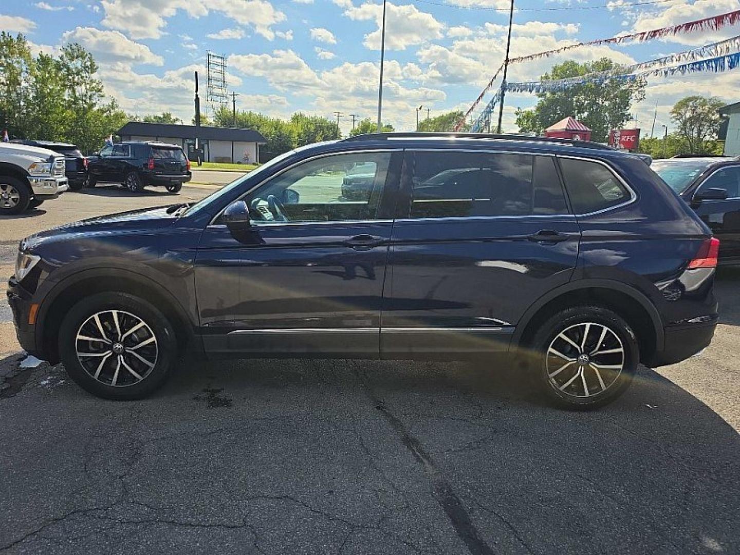 2021 BLUE /PUSHB Volkswagen Tiguan SE 4Motion AWD (3VV2B7AX0MM) with an 2.0L L4 DOHC 16V TURBO engine, 8A transmission, located at 3304 Woodville Road, Northwood, OH, 43619, (419) 210-8019, 41.612694, -83.480743 - Your #1 Destination for Auto Loans and mdash;No Matter Your Credit!At our dealership, we believe everyone deserves the opportunity to drive their dream car and mdash;whether you have good credit, bad credit, or no credit at all. With a wide selection of hundreds of cars, trucks, and SUVs, you'll fin- Photo#1