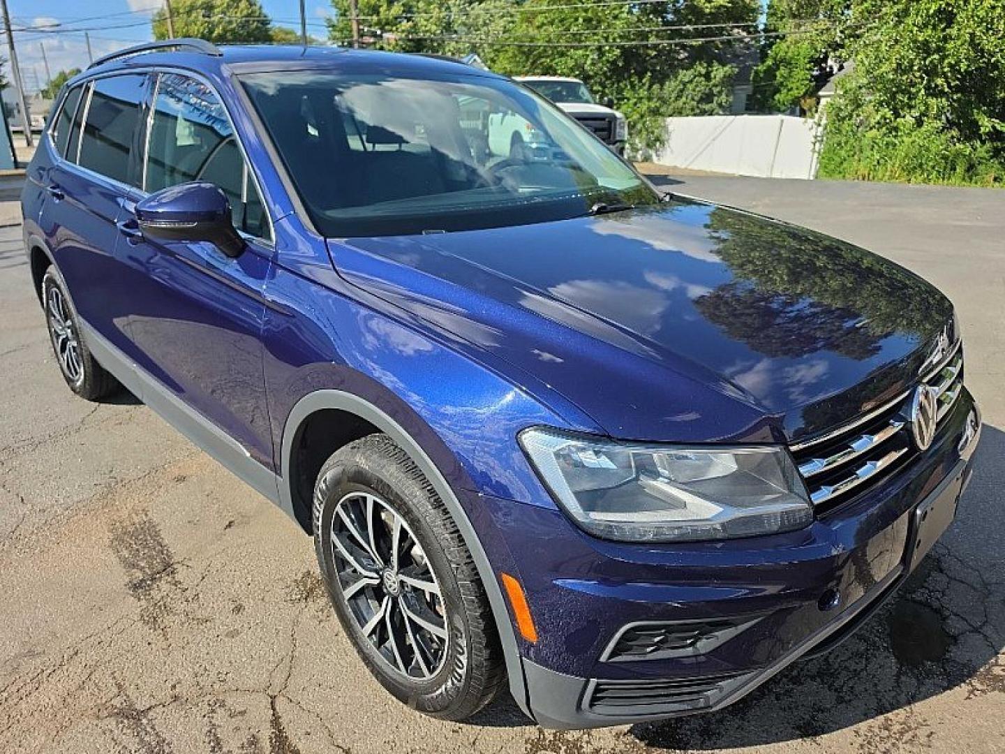 2021 BLUE /PUSHB Volkswagen Tiguan SE 4Motion AWD (3VV2B7AX0MM) with an 2.0L L4 DOHC 16V TURBO engine, 8A transmission, located at 3304 Woodville Road, Northwood, OH, 43619, (419) 210-8019, 41.612694, -83.480743 - Your #1 Destination for Auto Loans and mdash;No Matter Your Credit!At our dealership, we believe everyone deserves the opportunity to drive their dream car and mdash;whether you have good credit, bad credit, or no credit at all. With a wide selection of hundreds of cars, trucks, and SUVs, you'll fin- Photo#6