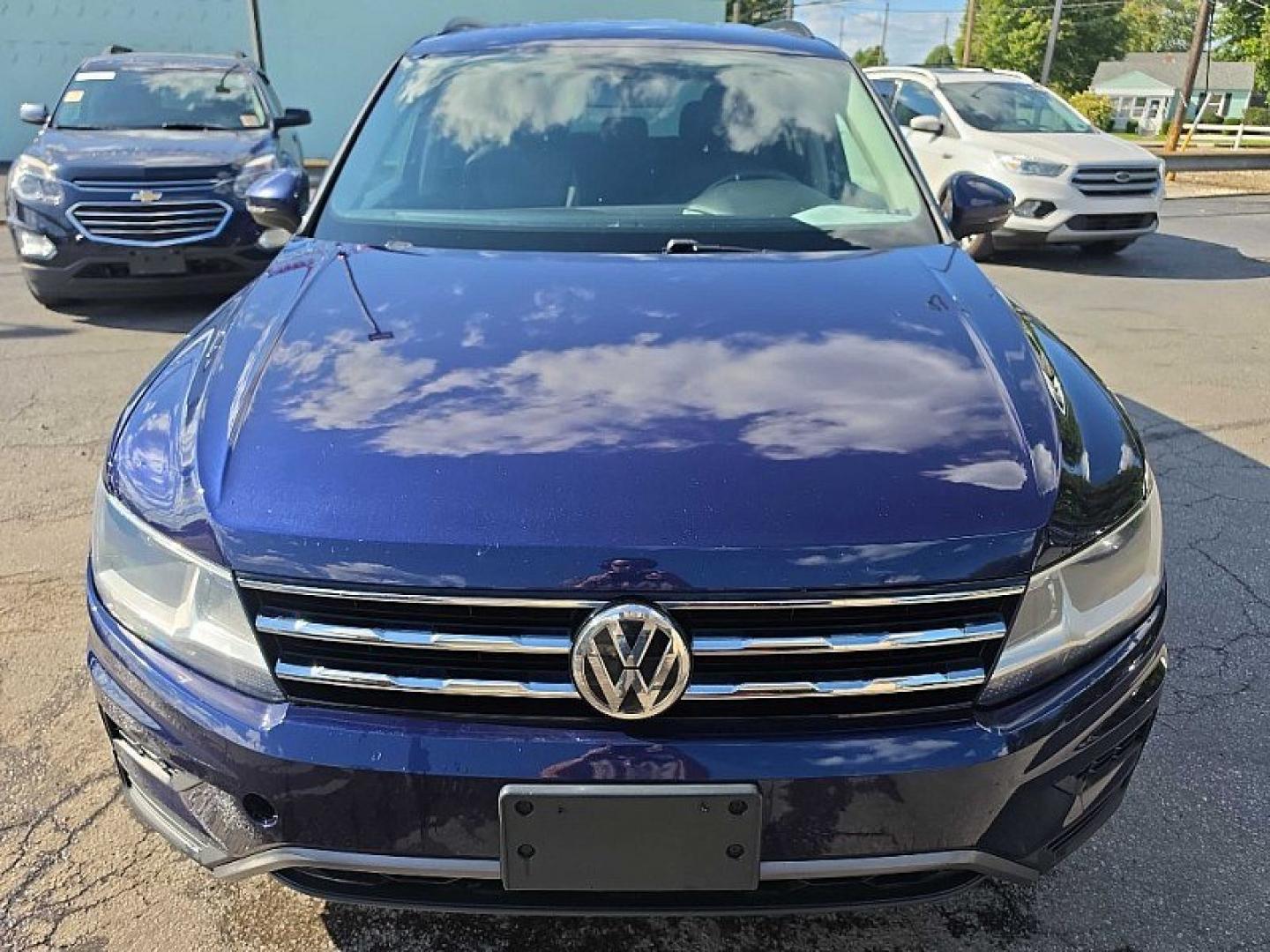 2021 BLUE /PUSHB Volkswagen Tiguan SE 4Motion AWD (3VV2B7AX0MM) with an 2.0L L4 DOHC 16V TURBO engine, 8A transmission, located at 3304 Woodville Road, Northwood, OH, 43619, (419) 210-8019, 41.612694, -83.480743 - Your #1 Destination for Auto Loans and mdash;No Matter Your Credit!At our dealership, we believe everyone deserves the opportunity to drive their dream car and mdash;whether you have good credit, bad credit, or no credit at all. With a wide selection of hundreds of cars, trucks, and SUVs, you'll fin- Photo#7