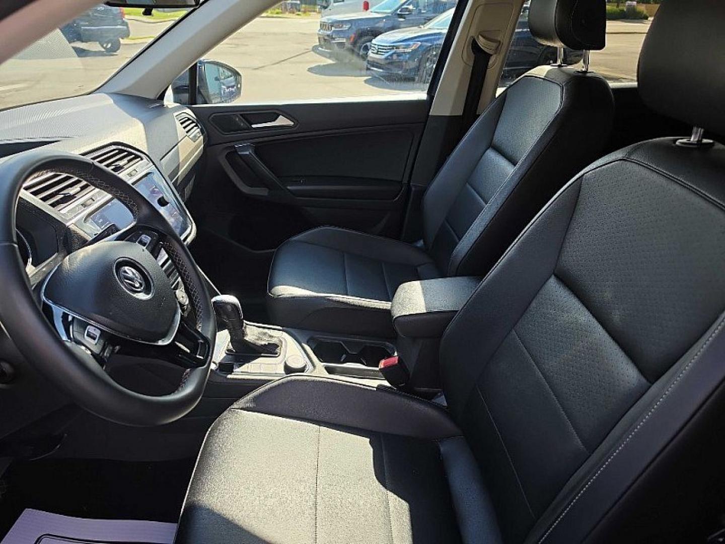 2021 BLUE /PUSHB Volkswagen Tiguan SE 4Motion AWD (3VV2B7AX0MM) with an 2.0L L4 DOHC 16V TURBO engine, 8A transmission, located at 3304 Woodville Road, Northwood, OH, 43619, (419) 210-8019, 41.612694, -83.480743 - Your #1 Destination for Auto Loans and mdash;No Matter Your Credit!At our dealership, we believe everyone deserves the opportunity to drive their dream car and mdash;whether you have good credit, bad credit, or no credit at all. With a wide selection of hundreds of cars, trucks, and SUVs, you'll fin- Photo#9