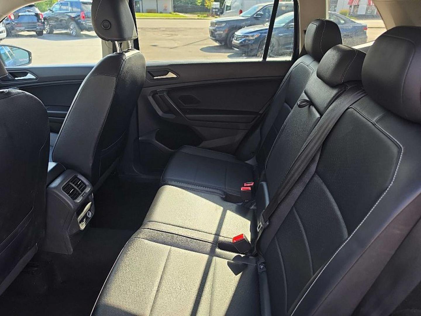 2021 BLUE /PUSHB Volkswagen Tiguan SE 4Motion AWD (3VV2B7AX0MM) with an 2.0L L4 DOHC 16V TURBO engine, 8A transmission, located at 3304 Woodville Road, Northwood, OH, 43619, (419) 210-8019, 41.612694, -83.480743 - Your #1 Destination for Auto Loans and mdash;No Matter Your Credit!At our dealership, we believe everyone deserves the opportunity to drive their dream car and mdash;whether you have good credit, bad credit, or no credit at all. With a wide selection of hundreds of cars, trucks, and SUVs, you'll fin- Photo#11
