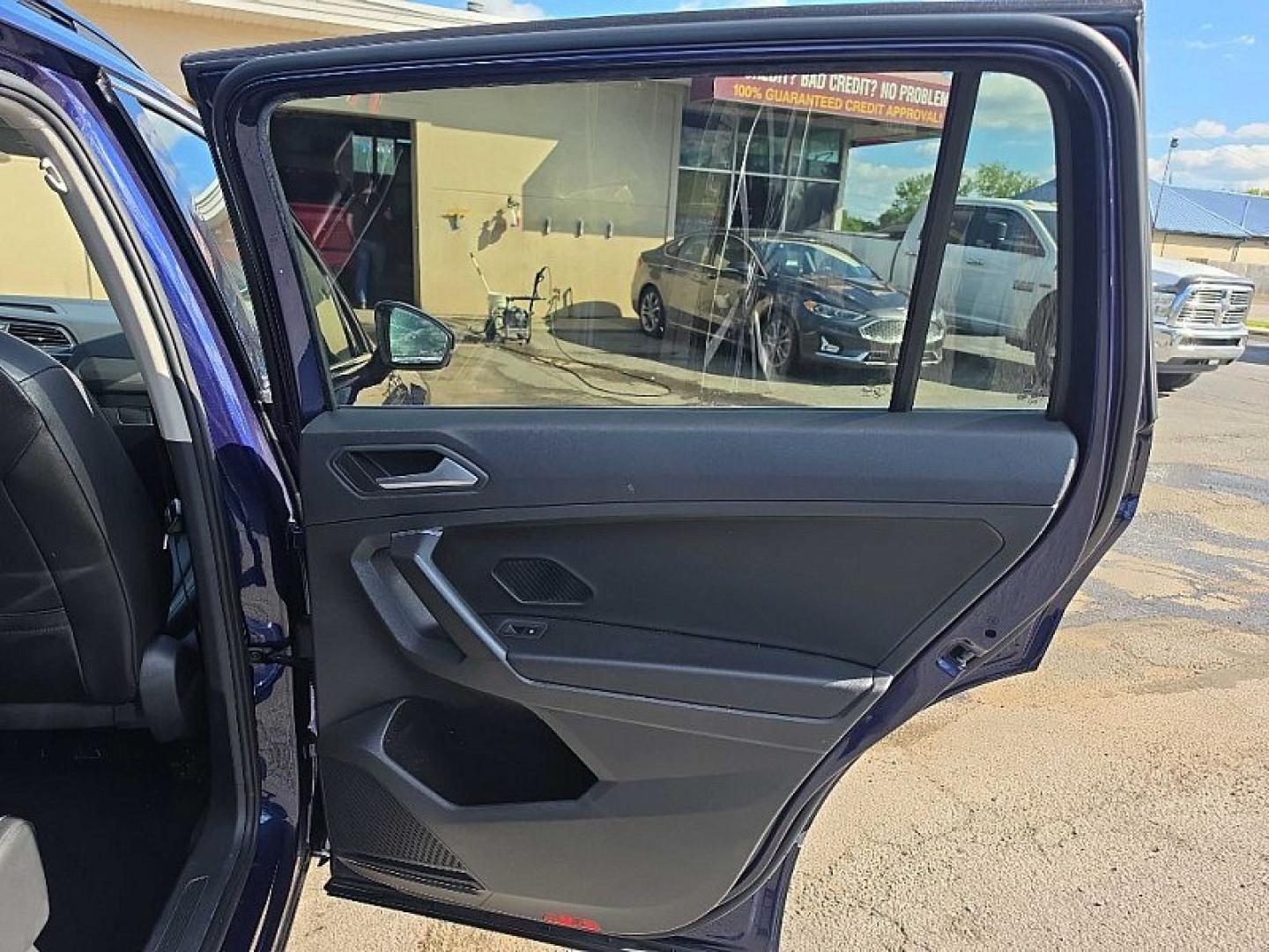 2021 BLUE /PUSHB Volkswagen Tiguan SE 4Motion AWD (3VV2B7AX0MM) with an 2.0L L4 DOHC 16V TURBO engine, 8A transmission, located at 3304 Woodville Road, Northwood, OH, 43619, (419) 210-8019, 41.612694, -83.480743 - Your #1 Destination for Auto Loans and mdash;No Matter Your Credit!At our dealership, we believe everyone deserves the opportunity to drive their dream car and mdash;whether you have good credit, bad credit, or no credit at all. With a wide selection of hundreds of cars, trucks, and SUVs, you'll fin- Photo#13