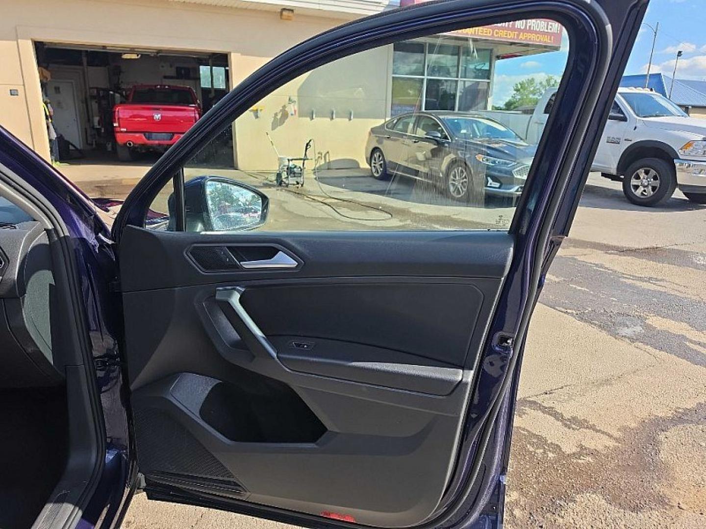 2021 BLUE /PUSHB Volkswagen Tiguan SE 4Motion AWD (3VV2B7AX0MM) with an 2.0L L4 DOHC 16V TURBO engine, 8A transmission, located at 3304 Woodville Road, Northwood, OH, 43619, (419) 210-8019, 41.612694, -83.480743 - Your #1 Destination for Auto Loans and mdash;No Matter Your Credit!At our dealership, we believe everyone deserves the opportunity to drive their dream car and mdash;whether you have good credit, bad credit, or no credit at all. With a wide selection of hundreds of cars, trucks, and SUVs, you'll fin- Photo#15