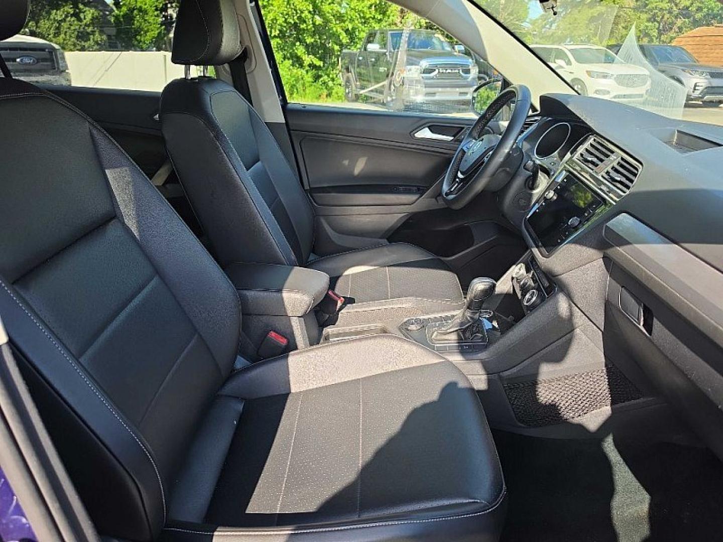 2021 BLUE /PUSHB Volkswagen Tiguan SE 4Motion AWD (3VV2B7AX0MM) with an 2.0L L4 DOHC 16V TURBO engine, 8A transmission, located at 3304 Woodville Road, Northwood, OH, 43619, (419) 210-8019, 41.612694, -83.480743 - Your #1 Destination for Auto Loans and mdash;No Matter Your Credit!At our dealership, we believe everyone deserves the opportunity to drive their dream car and mdash;whether you have good credit, bad credit, or no credit at all. With a wide selection of hundreds of cars, trucks, and SUVs, you'll fin- Photo#16