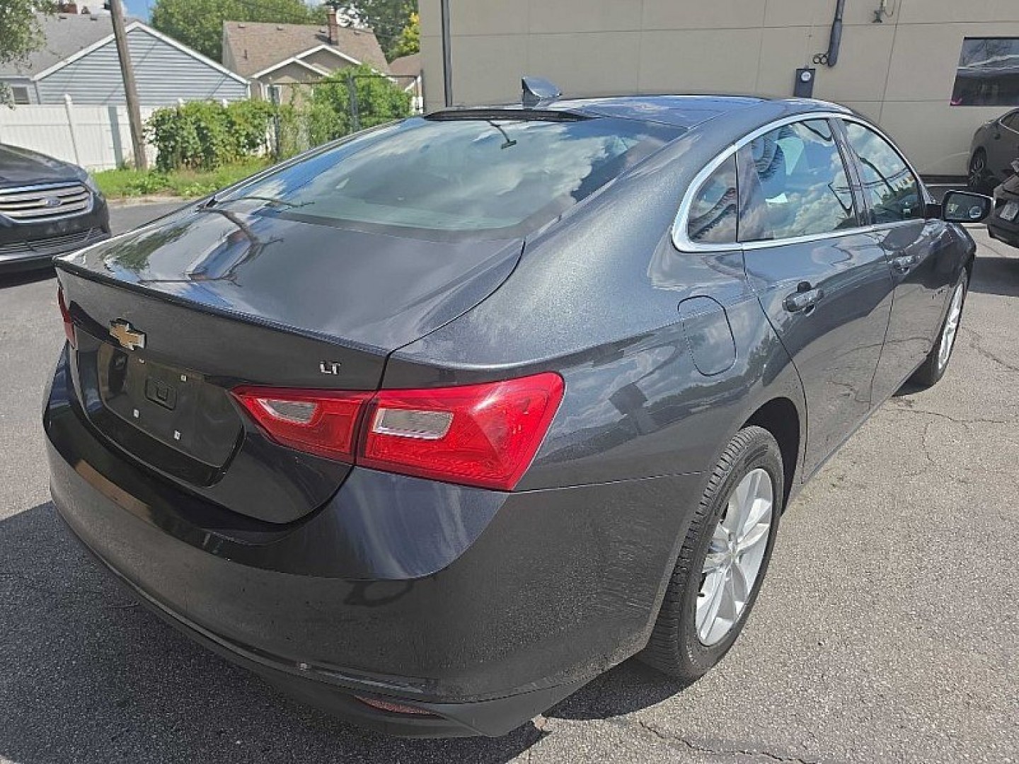 2017 GRAY Chevrolet Malibu 1LT (1G1ZE5STXHF) with an 1.5L L4 DOHC 16V engine, 6A transmission, located at 3304 Woodville Road, Northwood, OH, 43619, (419) 210-8019, 41.612694, -83.480743 - Your #1 Destination for Auto Loans and mdash;No Matter Your Credit!At our dealership, we believe everyone deserves the opportunity to drive their dream car and mdash;whether you have good credit, bad credit, or no credit at all. With a wide selection of hundreds of cars, trucks, and SUVs, you'll fin- Photo#4