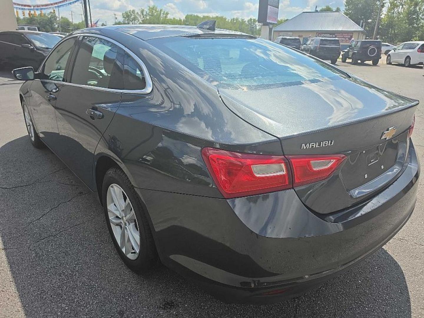 2017 GRAY Chevrolet Malibu 1LT (1G1ZE5STXHF) with an 1.5L L4 DOHC 16V engine, 6A transmission, located at 3304 Woodville Road, Northwood, OH, 43619, (419) 210-8019, 41.612694, -83.480743 - Your #1 Destination for Auto Loans and mdash;No Matter Your Credit!At our dealership, we believe everyone deserves the opportunity to drive their dream car and mdash;whether you have good credit, bad credit, or no credit at all. With a wide selection of hundreds of cars, trucks, and SUVs, you'll fin- Photo#2