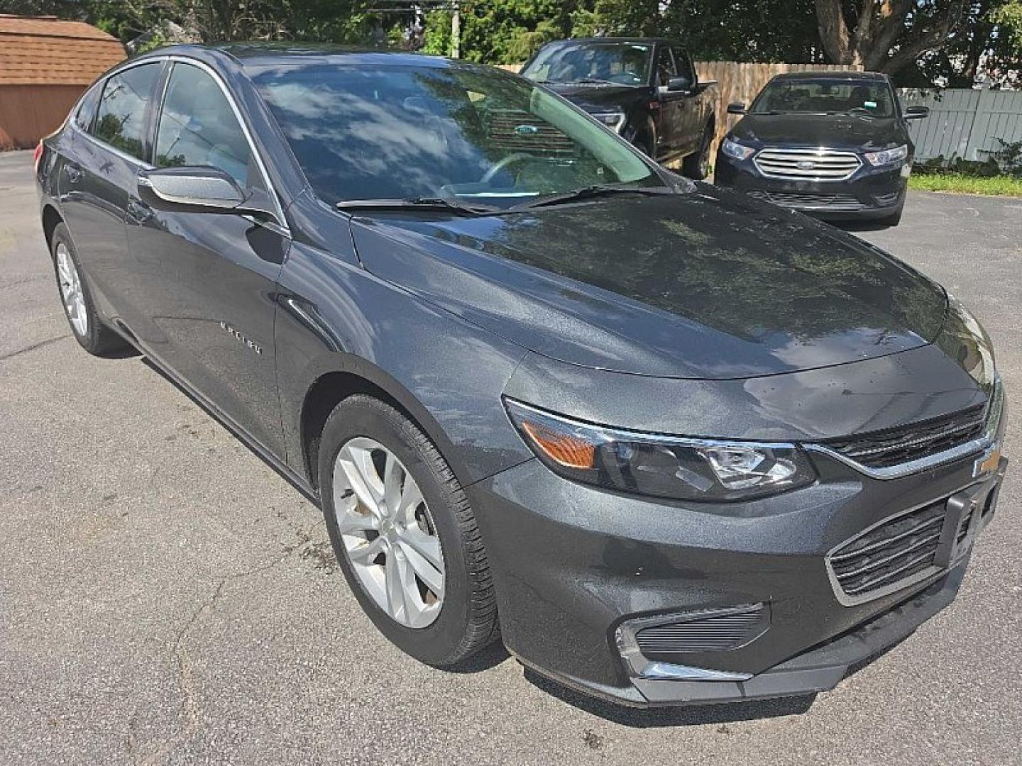 2017 GRAY Chevrolet Malibu 1LT (1G1ZE5STXHF) with an 1.5L L4 DOHC 16V engine, 6A transmission, located at 3304 Woodville Road, Northwood, OH, 43619, (419) 210-8019, 41.612694, -83.480743 - Your #1 Destination for Auto Loans and mdash;No Matter Your Credit!At our dealership, we believe everyone deserves the opportunity to drive their dream car and mdash;whether you have good credit, bad credit, or no credit at all. With a wide selection of hundreds of cars, trucks, and SUVs, you'll fin- Photo#6
