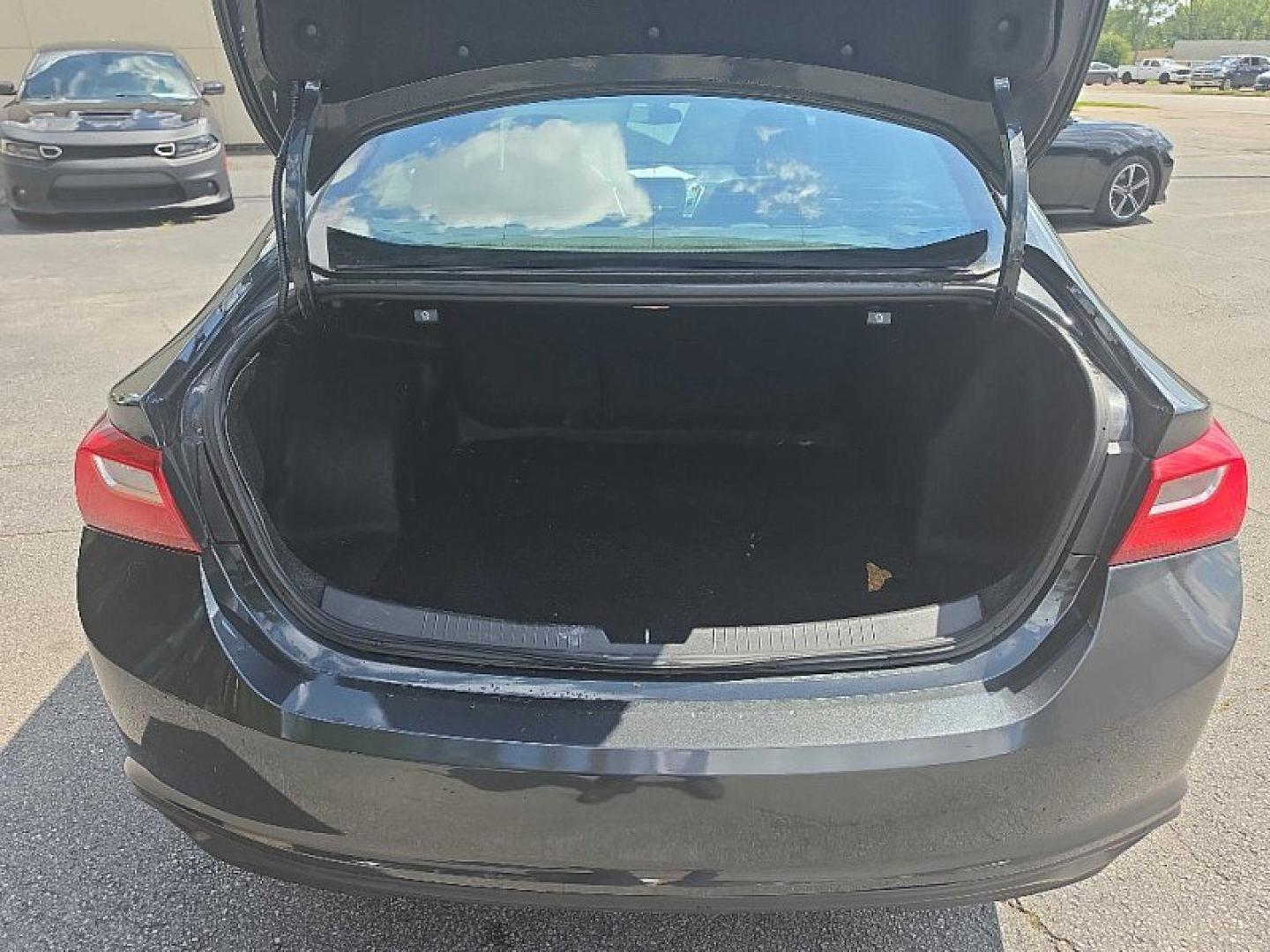 2017 GRAY Chevrolet Malibu 1LT (1G1ZE5STXHF) with an 1.5L L4 DOHC 16V engine, 6A transmission, located at 3304 Woodville Road, Northwood, OH, 43619, (419) 210-8019, 41.612694, -83.480743 - Your #1 Destination for Auto Loans and mdash;No Matter Your Credit!At our dealership, we believe everyone deserves the opportunity to drive their dream car and mdash;whether you have good credit, bad credit, or no credit at all. With a wide selection of hundreds of cars, trucks, and SUVs, you'll fin- Photo#12