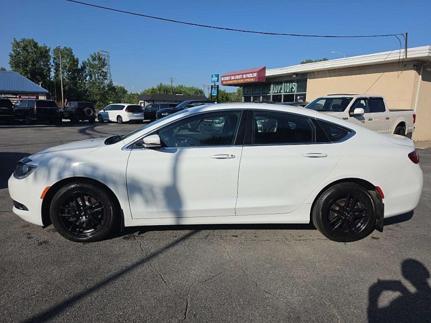 2016 WHITE /BLACK Chrysler 200 C (1C3CCCCG9GN) with an 3.6L V6 DOHC 24V FFV engine, 9A transmission, located at 3304 Woodville Road, Northwood, OH, 43619, (419) 210-8019, 41.612694, -83.480743 - Your #1 Destination for Auto Loans and mdash;No Matter Your Credit!At our dealership, we believe everyone deserves the opportunity to drive their dream car and mdash;whether you have good credit, bad credit, or no credit at all. With a wide selection of hundreds of cars, trucks, and SUVs, you'll fin- Photo#1