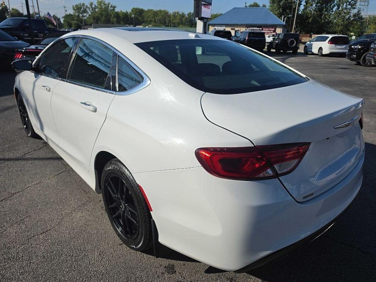 2016 WHITE /BLACK Chrysler 200 C (1C3CCCCG9GN) with an 3.6L V6 DOHC 24V FFV engine, 9A transmission, located at 3304 Woodville Road, Northwood, OH, 43619, (419) 210-8019, 41.612694, -83.480743 - Your #1 Destination for Auto Loans and mdash;No Matter Your Credit!At our dealership, we believe everyone deserves the opportunity to drive their dream car and mdash;whether you have good credit, bad credit, or no credit at all. With a wide selection of hundreds of cars, trucks, and SUVs, you'll fin- Photo#2