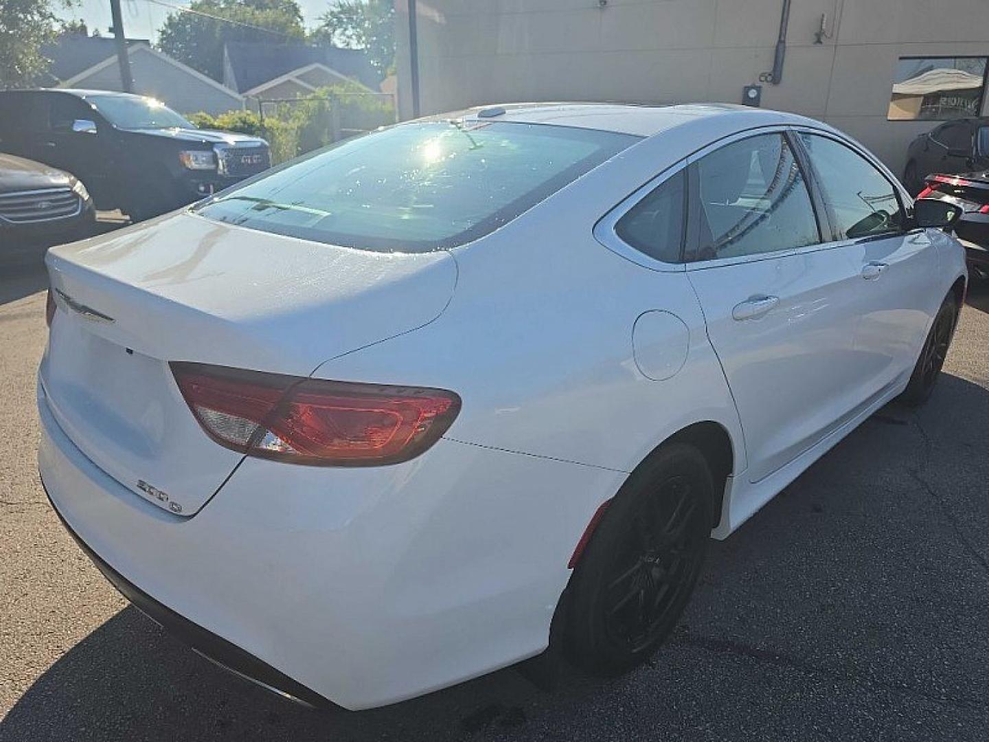 2016 WHITE /BLACK Chrysler 200 C (1C3CCCCG9GN) with an 3.6L V6 DOHC 24V FFV engine, 9A transmission, located at 3304 Woodville Road, Northwood, OH, 43619, (419) 210-8019, 41.612694, -83.480743 - Your #1 Destination for Auto Loans and mdash;No Matter Your Credit!At our dealership, we believe everyone deserves the opportunity to drive their dream car and mdash;whether you have good credit, bad credit, or no credit at all. With a wide selection of hundreds of cars, trucks, and SUVs, you'll fin- Photo#4