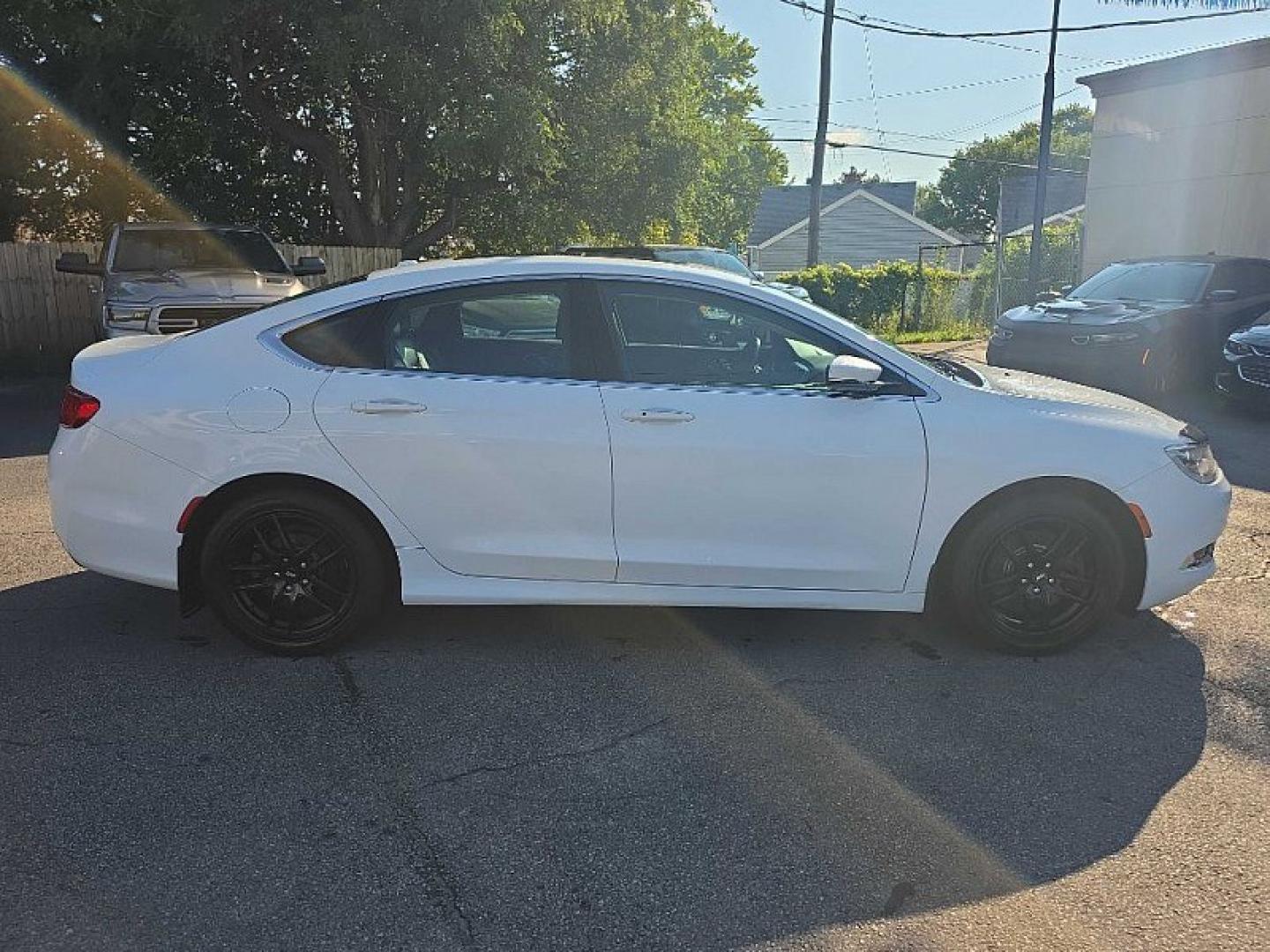 2016 WHITE /BLACK Chrysler 200 C (1C3CCCCG9GN) with an 3.6L V6 DOHC 24V FFV engine, 9A transmission, located at 3304 Woodville Road, Northwood, OH, 43619, (419) 210-8019, 41.612694, -83.480743 - Your #1 Destination for Auto Loans and mdash;No Matter Your Credit!At our dealership, we believe everyone deserves the opportunity to drive their dream car and mdash;whether you have good credit, bad credit, or no credit at all. With a wide selection of hundreds of cars, trucks, and SUVs, you'll fin- Photo#5