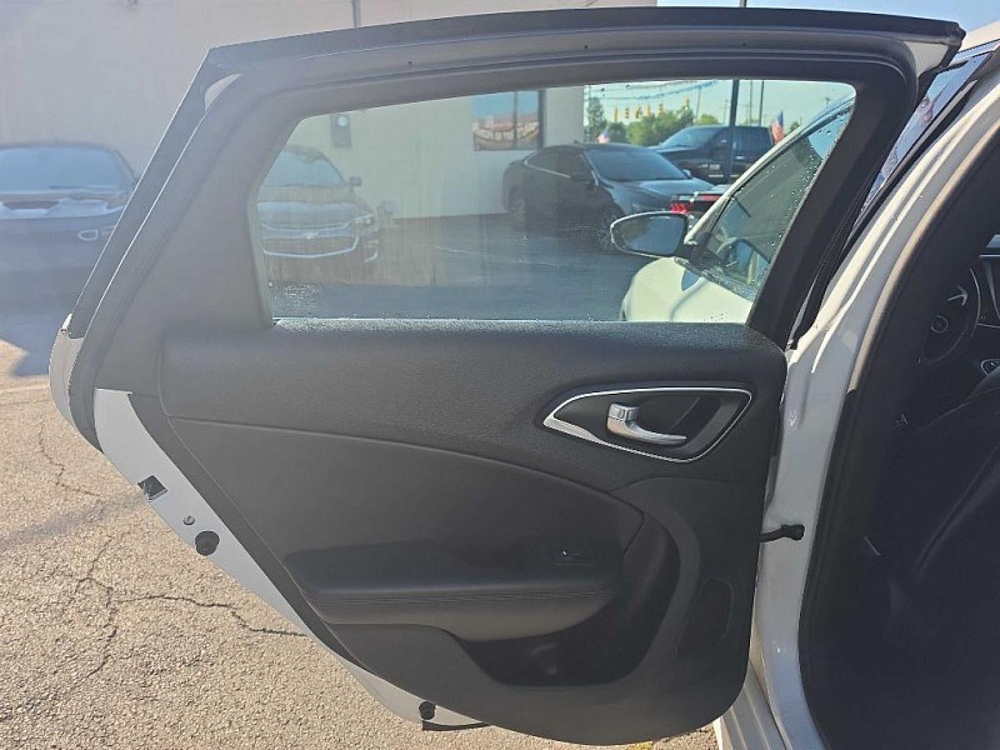 2016 WHITE /BLACK Chrysler 200 C (1C3CCCCG9GN) with an 3.6L V6 DOHC 24V FFV engine, 9A transmission, located at 3304 Woodville Road, Northwood, OH, 43619, (419) 210-8019, 41.612694, -83.480743 - Your #1 Destination for Auto Loans and mdash;No Matter Your Credit!At our dealership, we believe everyone deserves the opportunity to drive their dream car and mdash;whether you have good credit, bad credit, or no credit at all. With a wide selection of hundreds of cars, trucks, and SUVs, you'll fin- Photo#10