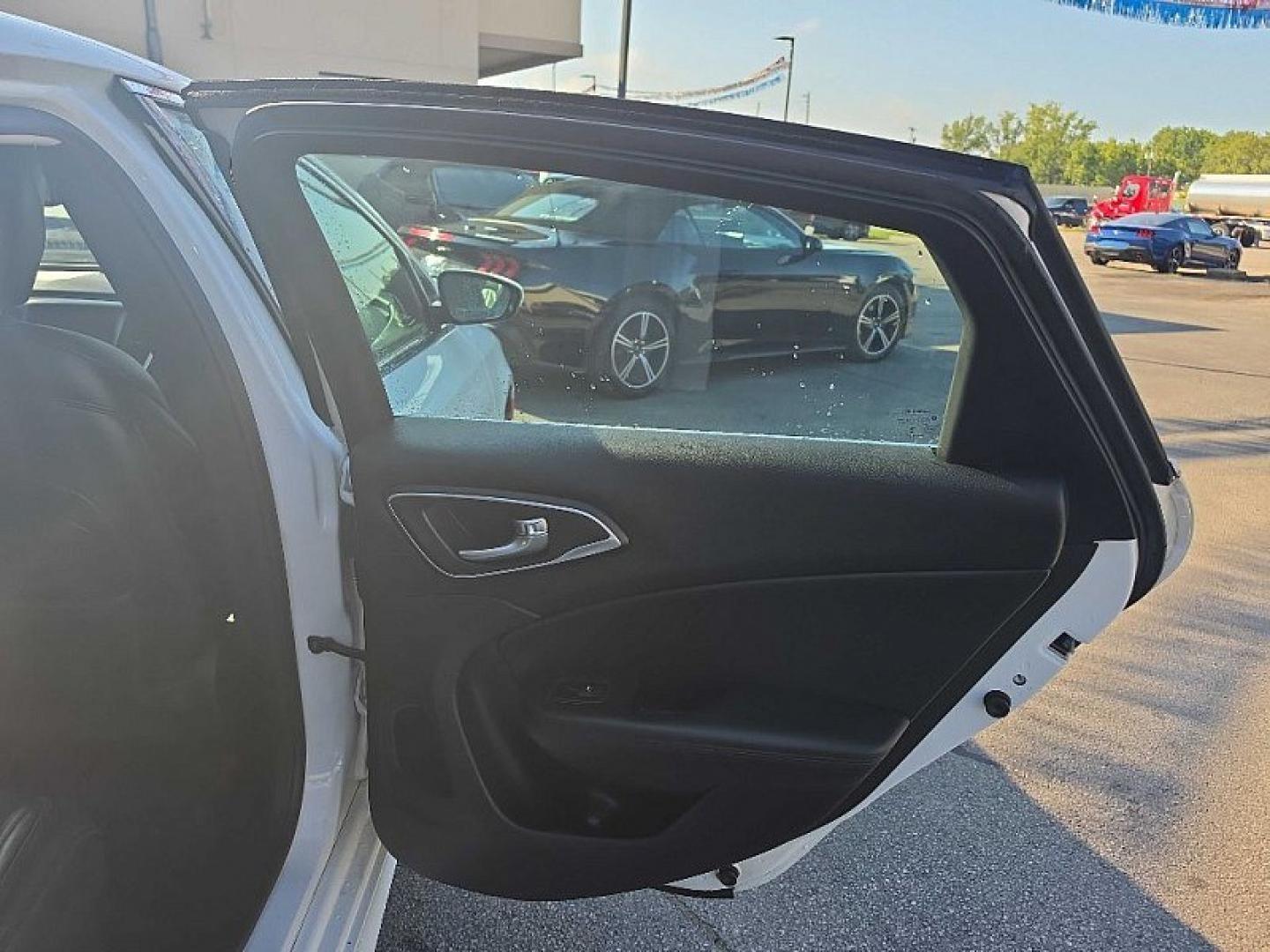 2016 WHITE /BLACK Chrysler 200 C (1C3CCCCG9GN) with an 3.6L V6 DOHC 24V FFV engine, 9A transmission, located at 3304 Woodville Road, Northwood, OH, 43619, (419) 210-8019, 41.612694, -83.480743 - Your #1 Destination for Auto Loans and mdash;No Matter Your Credit!At our dealership, we believe everyone deserves the opportunity to drive their dream car and mdash;whether you have good credit, bad credit, or no credit at all. With a wide selection of hundreds of cars, trucks, and SUVs, you'll fin- Photo#13