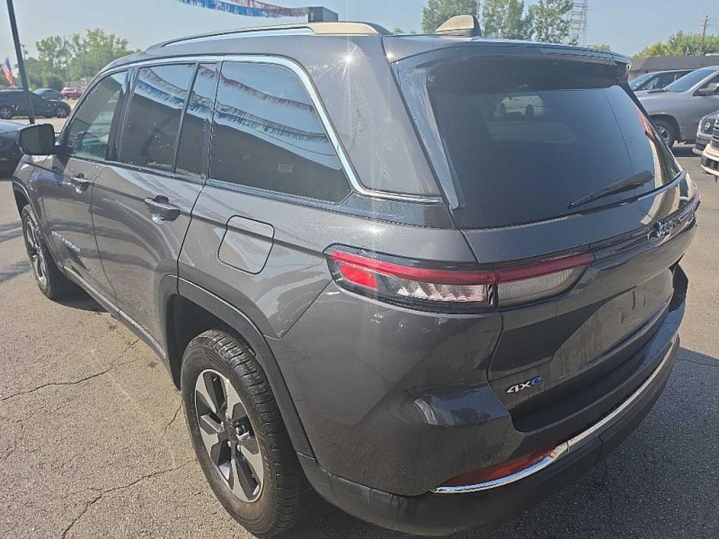 2023 GRAY /BLACK Jeep Grand Cherokee 4xe Limited (1C4RJYB62PC) with an 2.0L L4 DOHC 16V HYBRID engine, 8A transmission, located at 3304 Woodville Road, Northwood, OH, 43619, (419) 210-8019, 41.612694, -83.480743 - Your #1 Destination for Auto Loans and mdash;No Matter Your Credit!At our dealership, we believe everyone deserves the opportunity to drive their dream car and mdash;whether you have good credit, bad credit, or no credit at all. With a wide selection of hundreds of cars, trucks, and SUVs, you'll fin- Photo#2