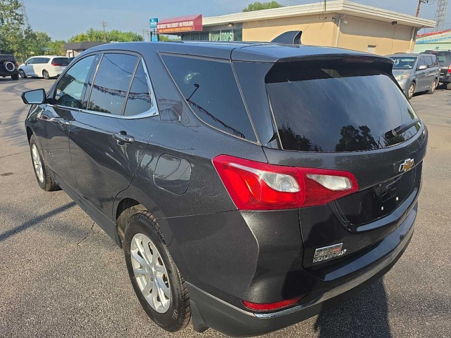 2019 GRAY /BLACK Chevrolet Equinox LT AWD (2GNAXUEV8K6) with an 1.5L L4 DOHC 16V TURBO engine, 6A transmission, located at 3304 Woodville Road, Northwood, OH, 43619, (419) 210-8019, 41.612694, -83.480743 - Your #1 Destination for Auto Loans and mdash;No Matter Your Credit!At our dealership, we believe everyone deserves the opportunity to drive their dream car and mdash;whether you have good credit, bad credit, or no credit at all. With a wide selection of hundreds of cars, trucks, and SUVs, you'll fin- Photo#3